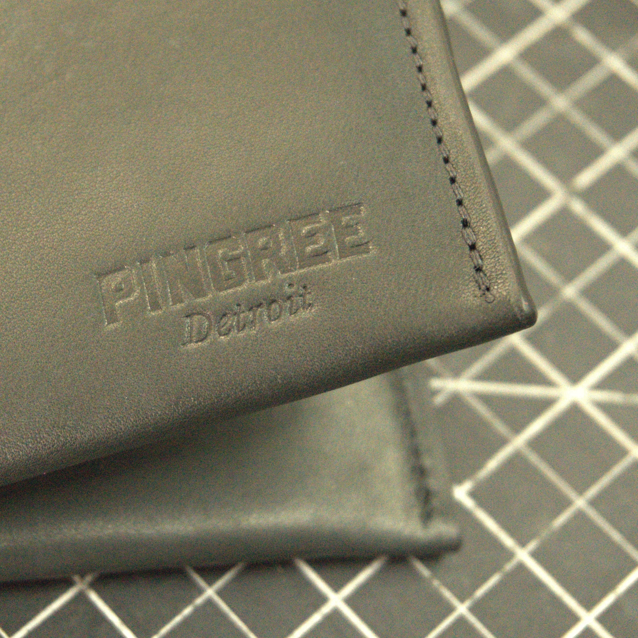 The Willow Run Wallet is cut, sewn and assembled in Detroit, MI with upcycled automotive leather and American-made thread and rip stop
Lining. It is RFID blocking American made and will come with the picture of the Veteran show who made it.