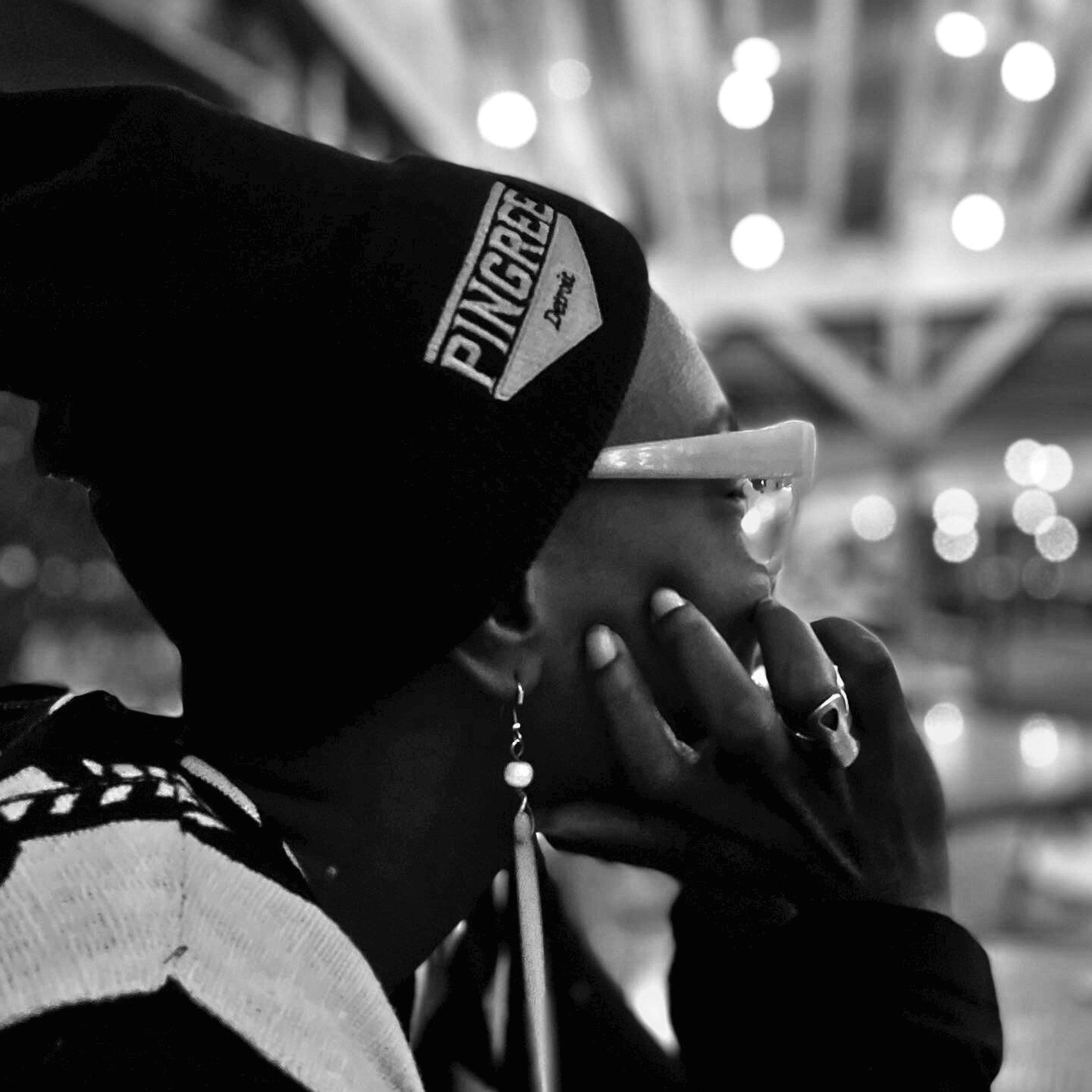 3D knit hats made in Detroit with upcycled yarn. Hand sewn and made with zero waste. Pictured here in Onyx black, modeled by a Detroiter.