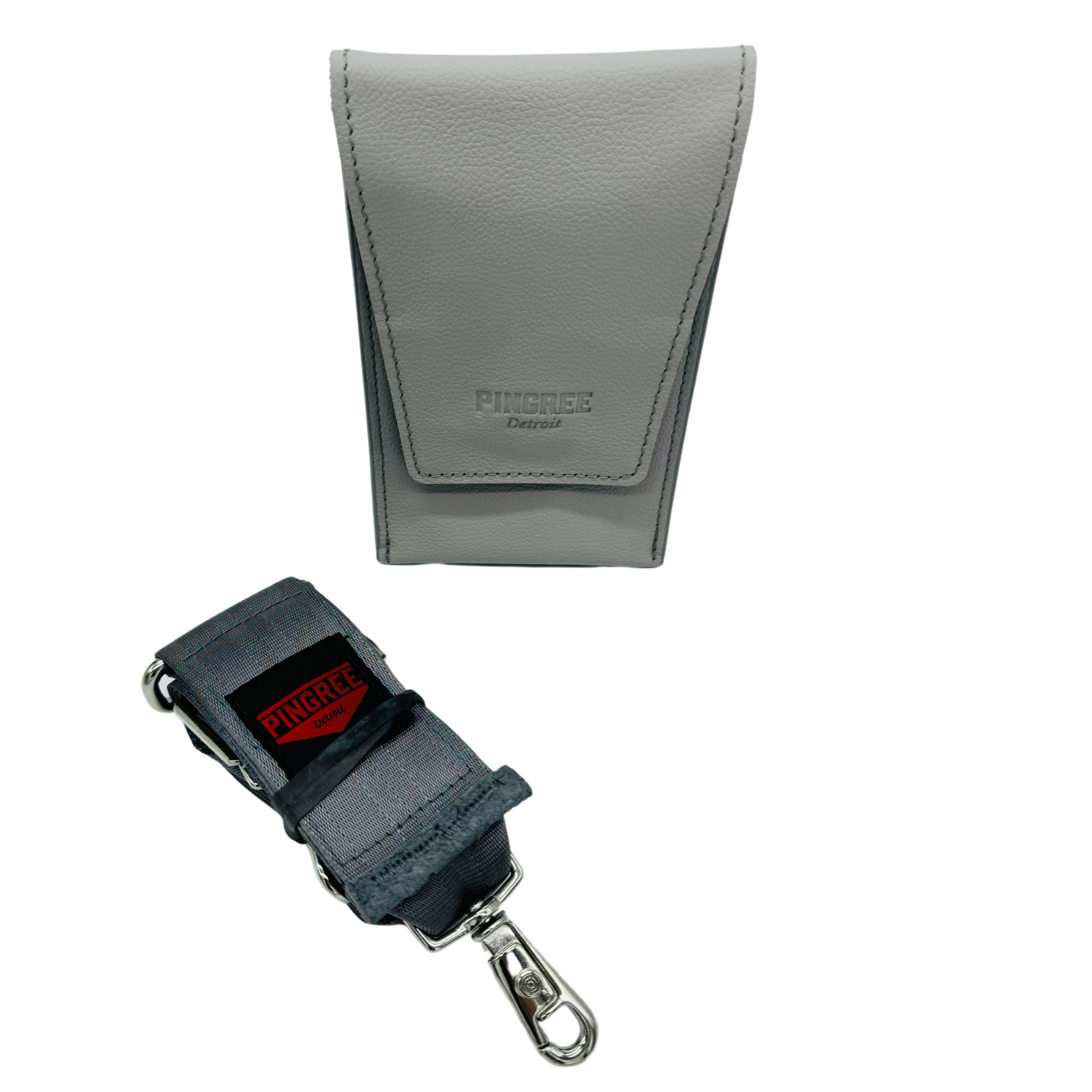Pictured here in Silver. A versatile Detroit made bag that gets you into every NFL stadium or concert venue. Holds any size phone, made in America, and holds a wallet. Seatbelt strap or leather strap included.