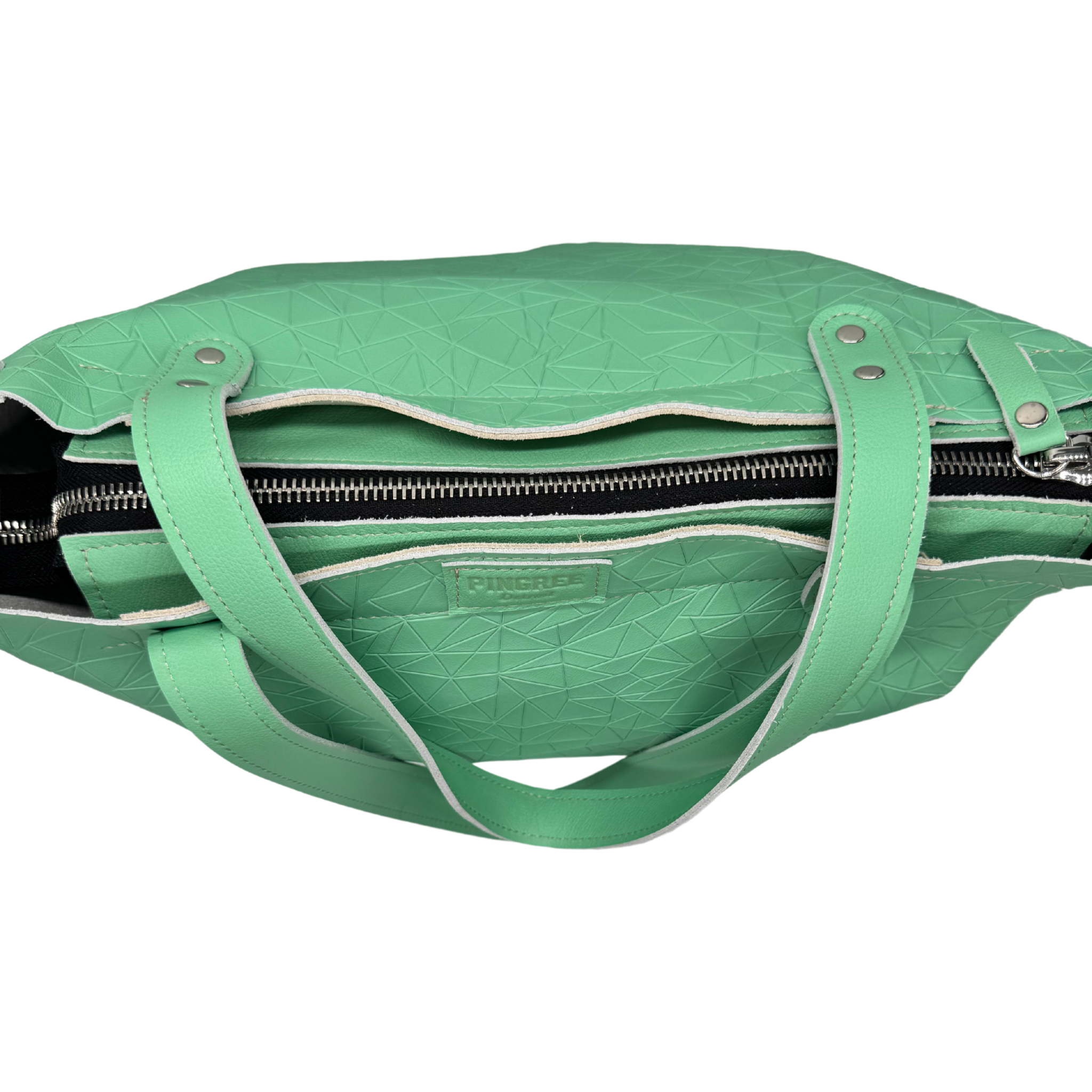 view of the bag with zipper and d-rings for carrying straps. American made hardware and crafted by Veterans and DETROITERS and guarantee for life.