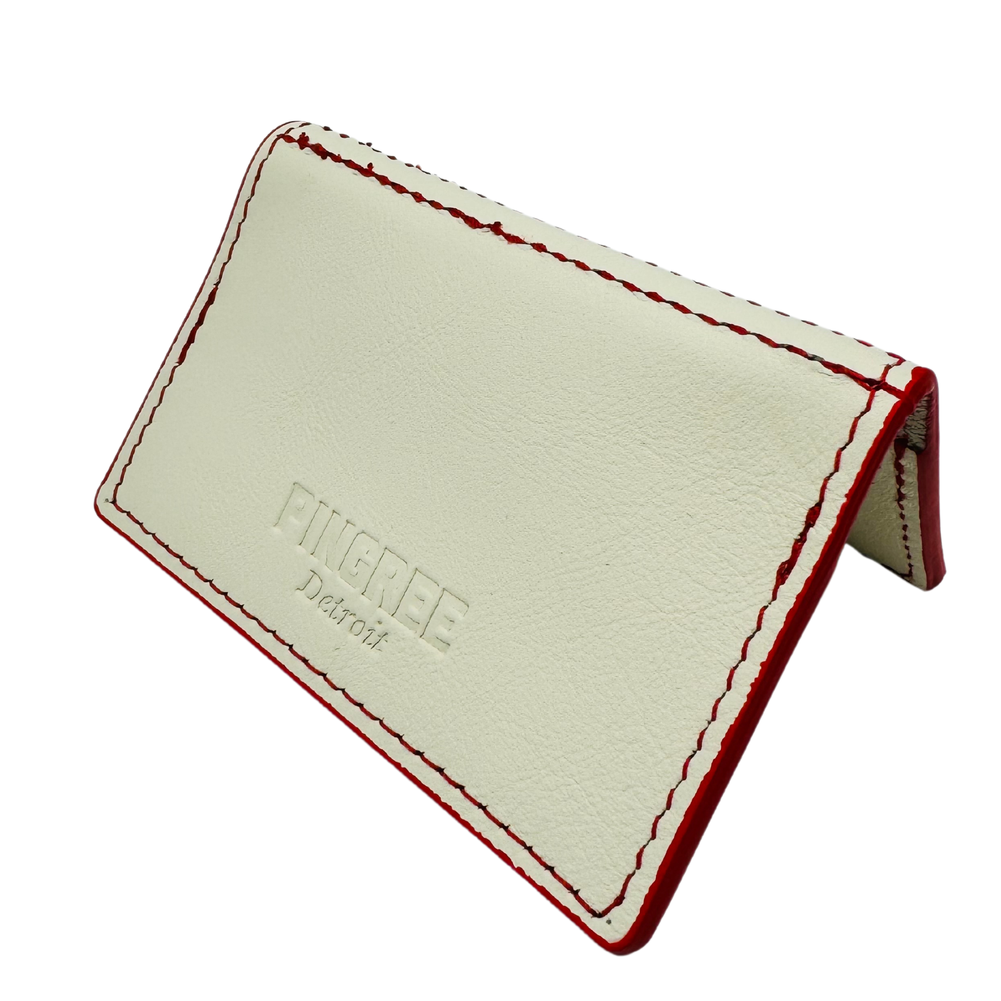 Pictures here in white with red stitching and red edge paint. A four pocket minimalist front pocket wallet made with leather upcycled from the production of new cars, wallet is handmade in the USA, made in America, made in Detroit, with four card slots each holding two cards plus a cash pouch in the middle.