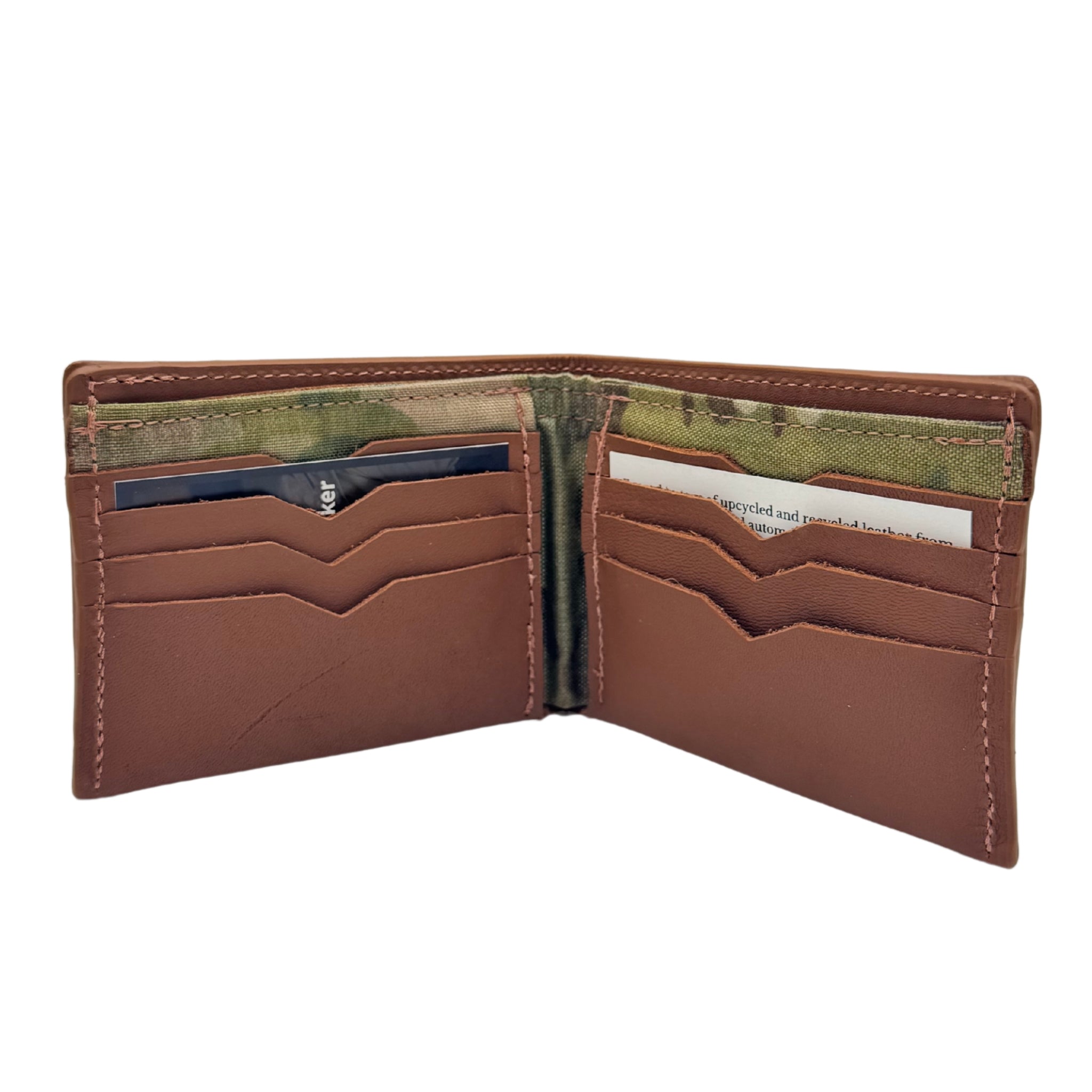 Brown leather billfold wallet, pictured here open. Made in Detroit, Michigan USA. Big enough for George Costanza, 10 pockets, leather upcycled from the production of new cars, handmade in Detroit by U.S. Veterans and Detroiters. Liner made from upcycled material from the production of Army tents.