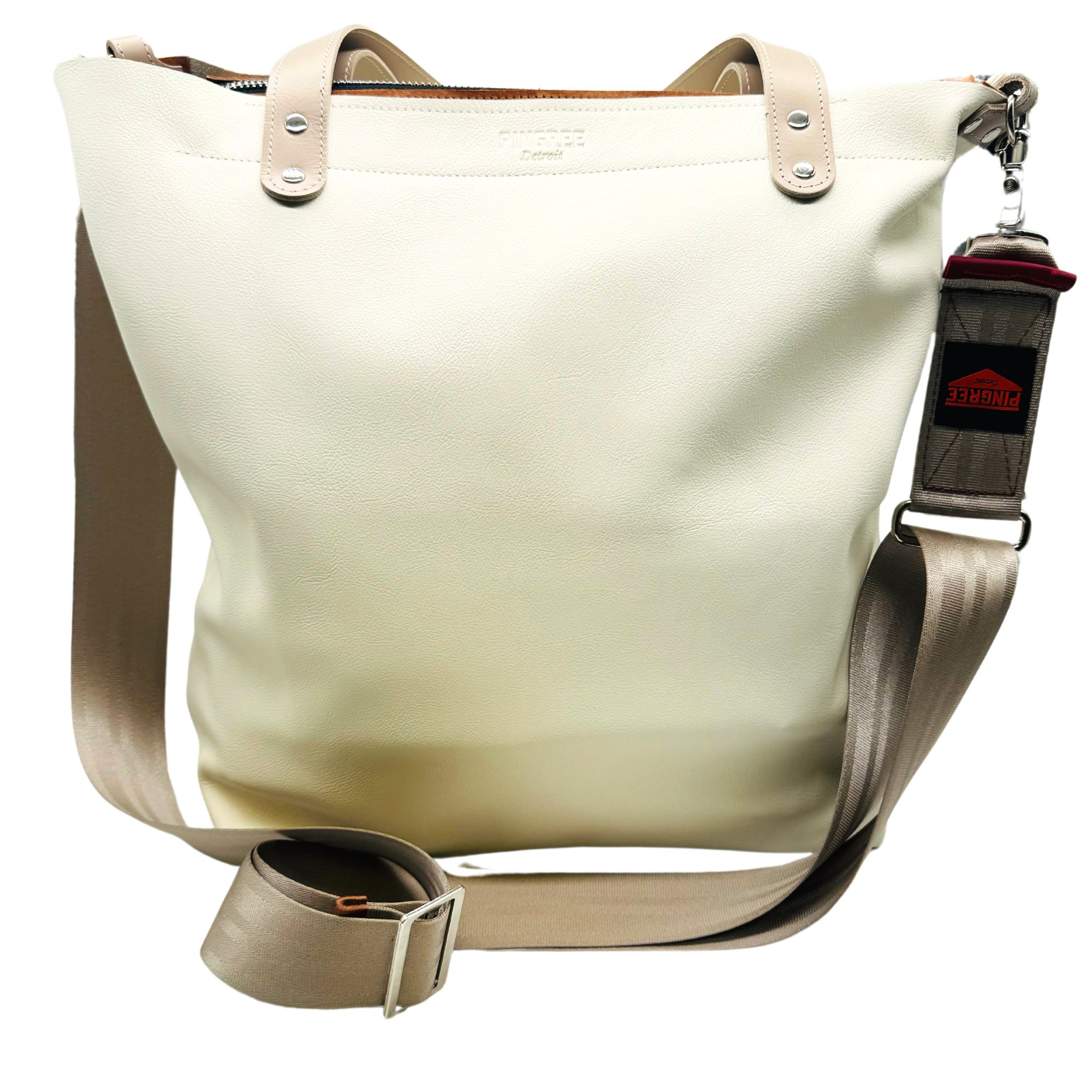 📸 Product on White Background:
Front shot of our off white leather carryon in a tote. M1 Travel Tote made in Detroit from upcycled automotive leather, shown with detachable crossbody strap – sustainable, durable travel bag for everyday use.”