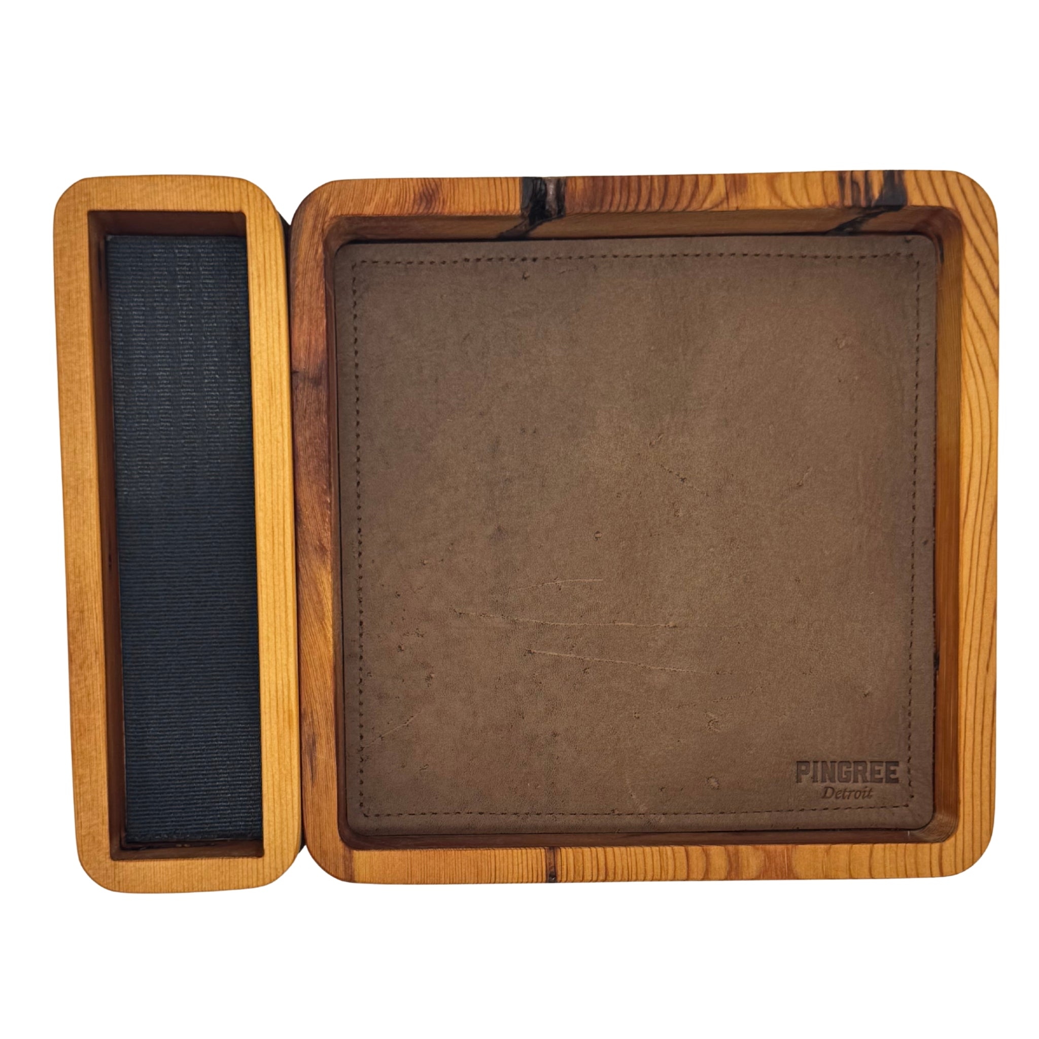 Pictured here in brown, Handcrafted modular valet tray made in Detroit from reclaimed wood and upcycled automotive leather, featuring a removable jewelry and watch holder — perfect for home, office, or hotel organization and sustainable gift giving. Pictured here in a deep walnut brown.