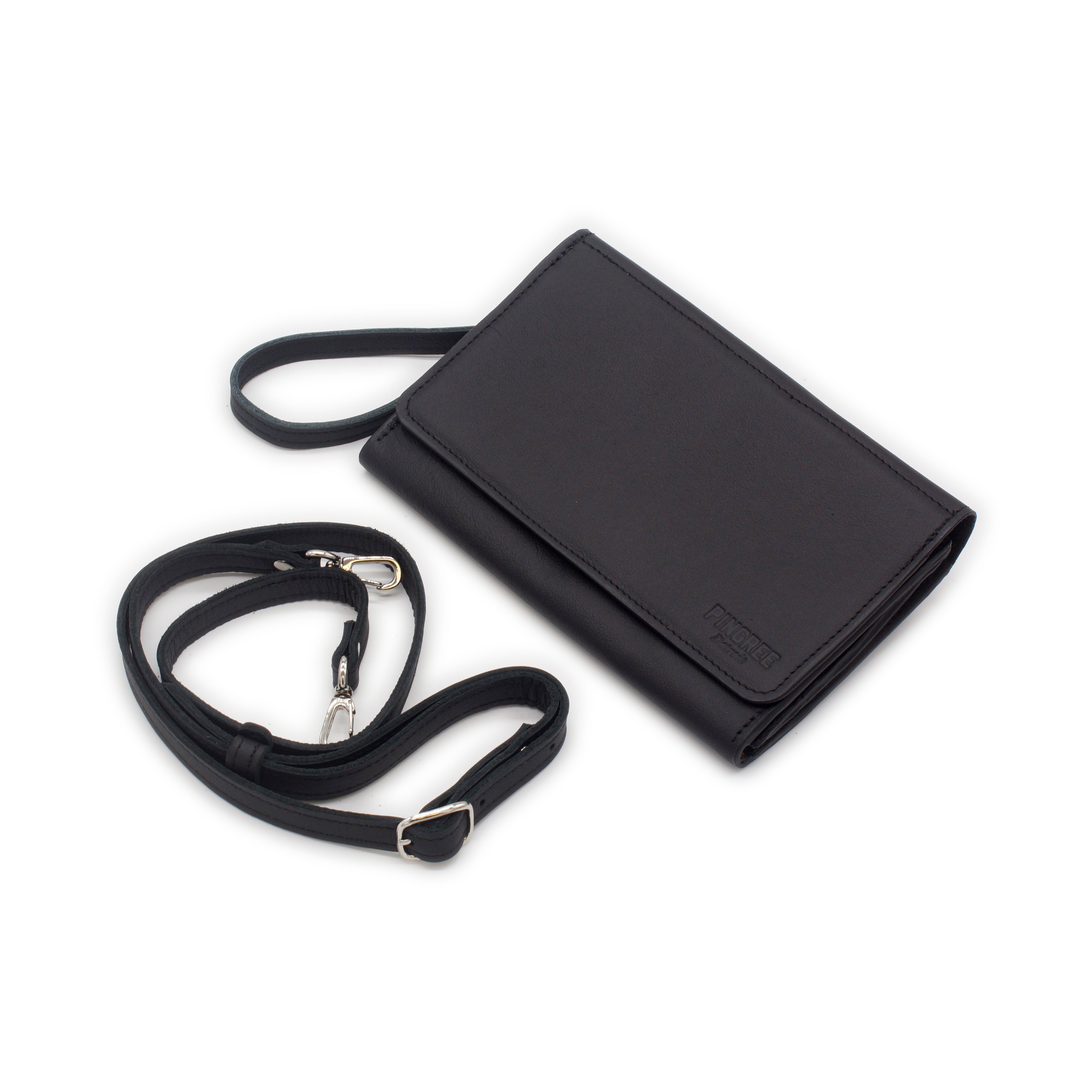 The Adeline Lux, pictured here with a leather strap, wristlet, and black leather, upcycled from the automotive industry, with clean rounded corners, magnetic closure, and a wristlet. This 5-in-1 bag is handmade in Detroit, MI USA, with upcycled leather from the automotive industry. Each comes with a picture of the Veteran or Detroiter who made it.
