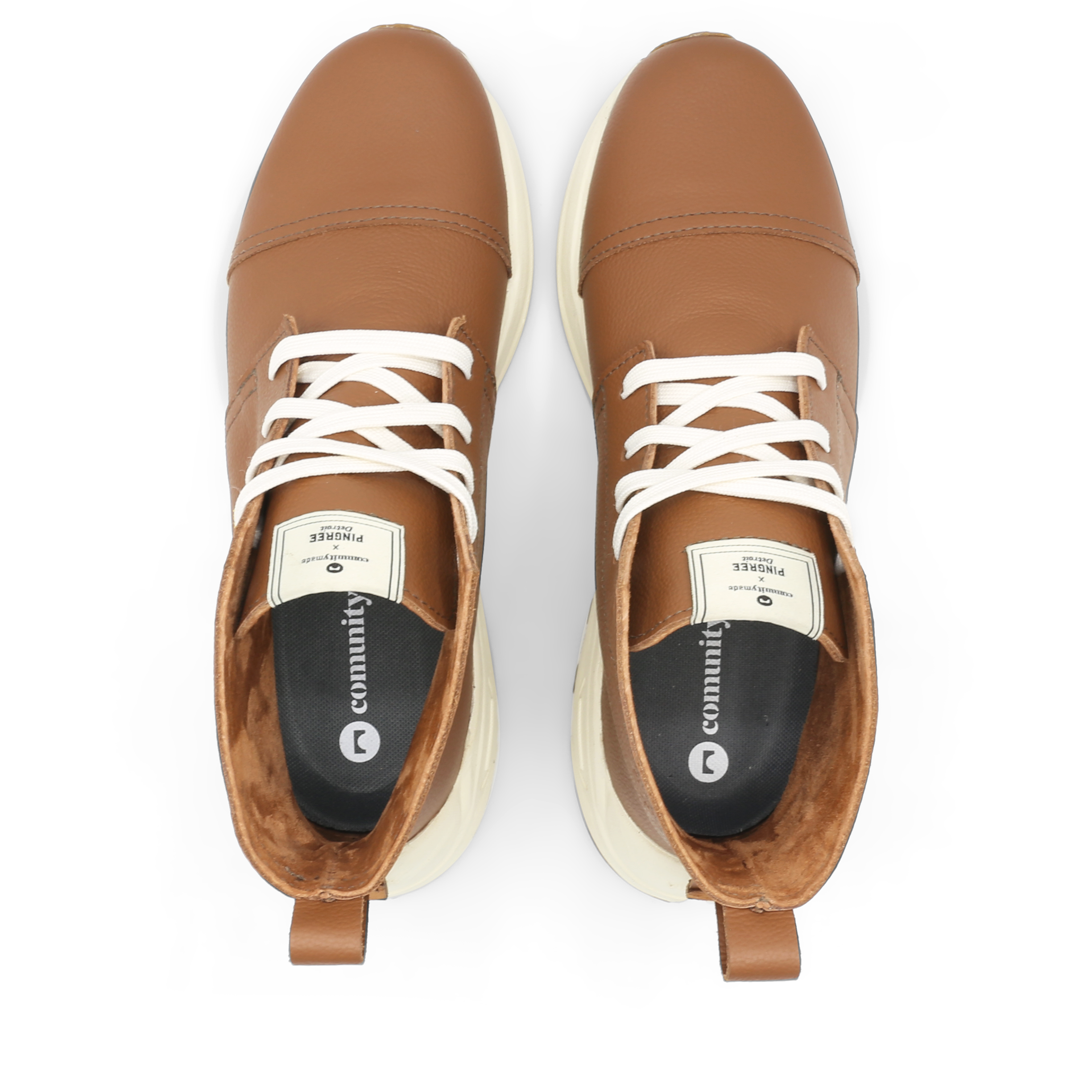 The Chukka boot pictured here from the top view showing off the suede interior in oak tree brown is Designed and handmade collaboratively in the USA alongside @comunitymade with upcycled leather and our new Vibram ecostep sole made from recycled materials. This boot’s got the perfect mix of style, comfort, durability, and a lighter footprint on the planet.