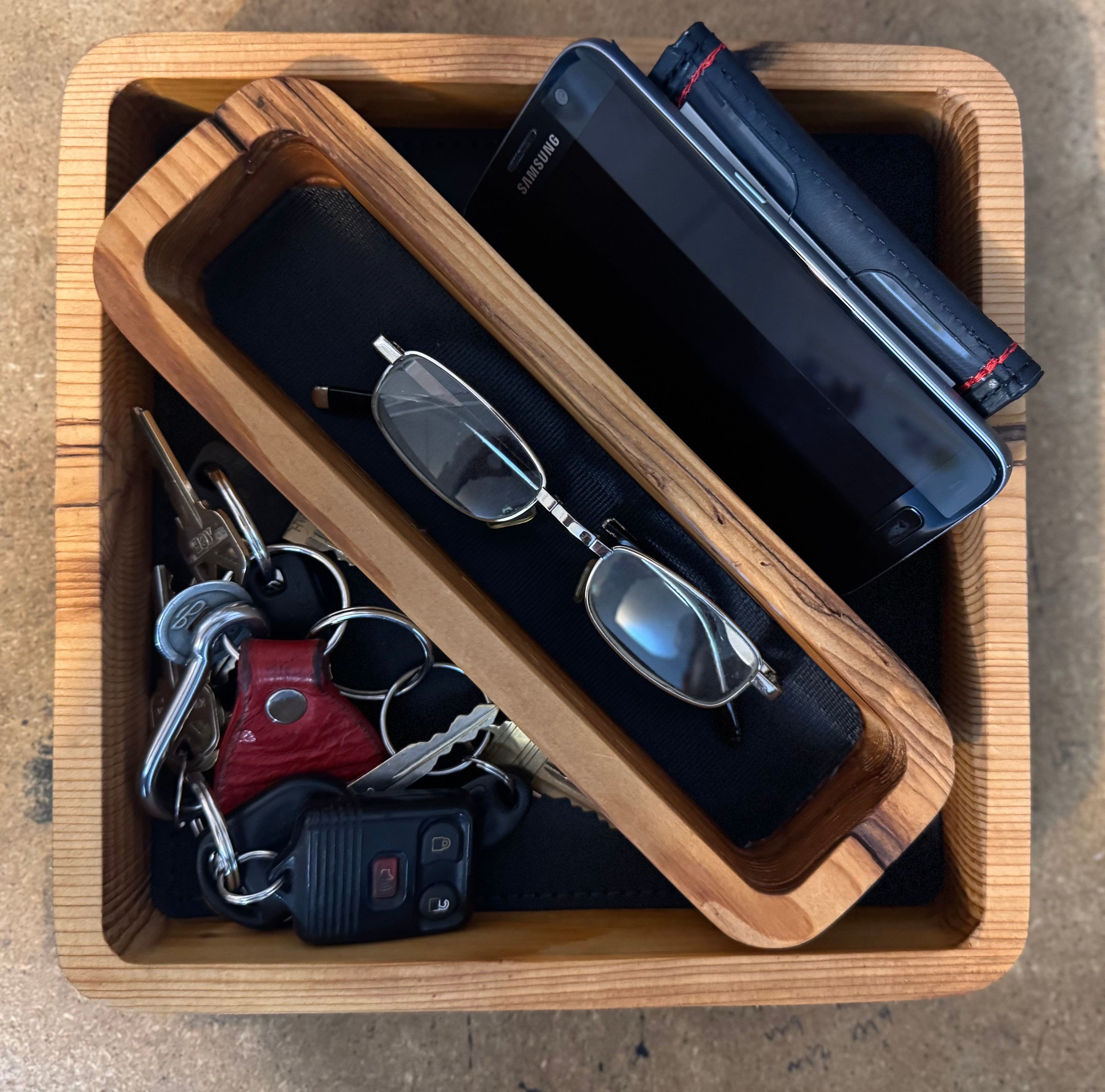 Luxury valet tray handcrafted in Detroit with sustainable materials — reclaimed wood and upcycled auto leather — great for boutique hotels or curated guest room amenities