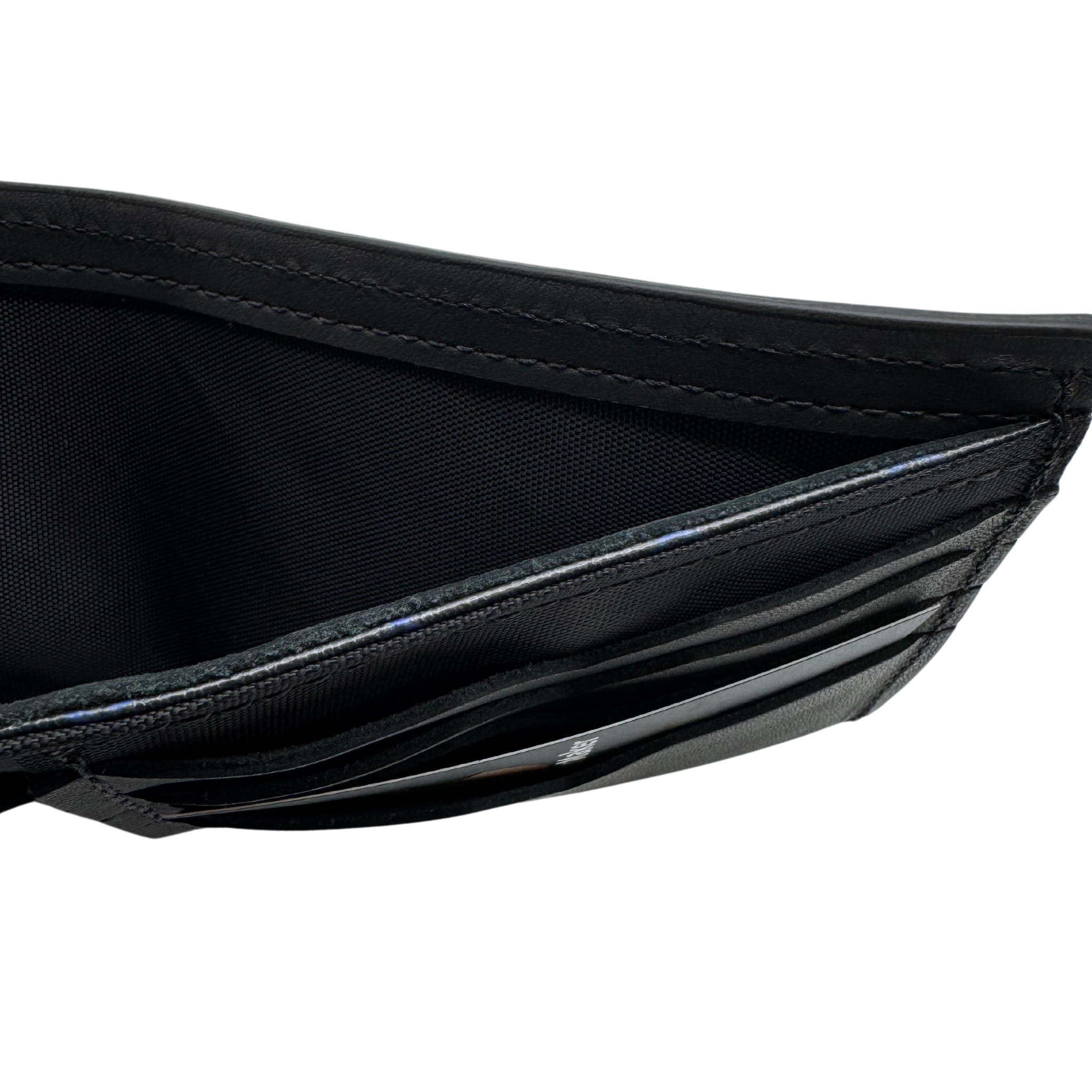 The black lined Willow Run Wallet is cut, sewn and assembled in Detroit, MI with upcycled automotive leather and American-made thread and rip stop
Lining. It is RFID blocking American made and will come with the picture of the Veteran show who made it.