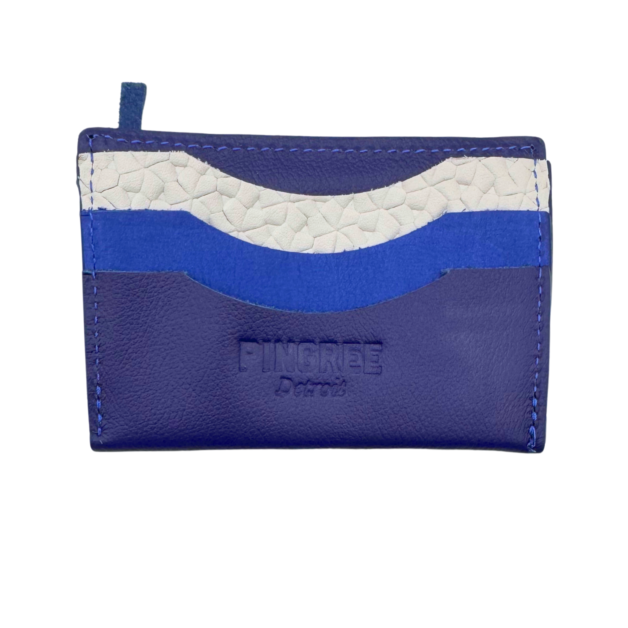 Picture here in a dark blue.
A simple, minimalist, durable, leather wallet that holds up to 8 credit cards and includes a rear zipper. Cash fits perfectly folded once in the top slot. All materials are upcycled from the automotive industry or American-made.