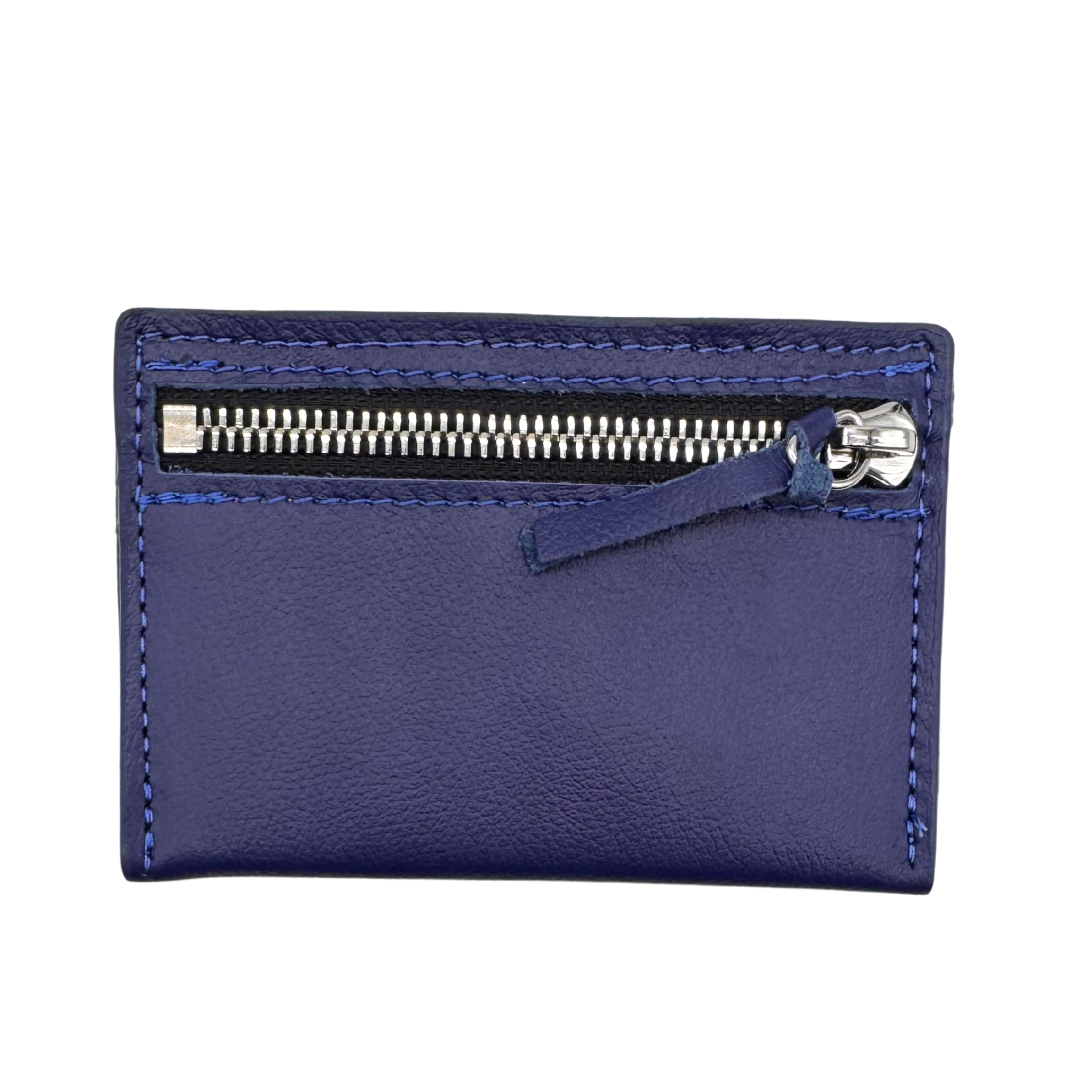 The rear zipper pictured here. A simple, minimalist, durable, leather wallet that holds up to 8 credit cards and includes a rear zipper. Cash fits perfectly folded once in the top slot. All materials are upcycled from the automotive industry or American-made.