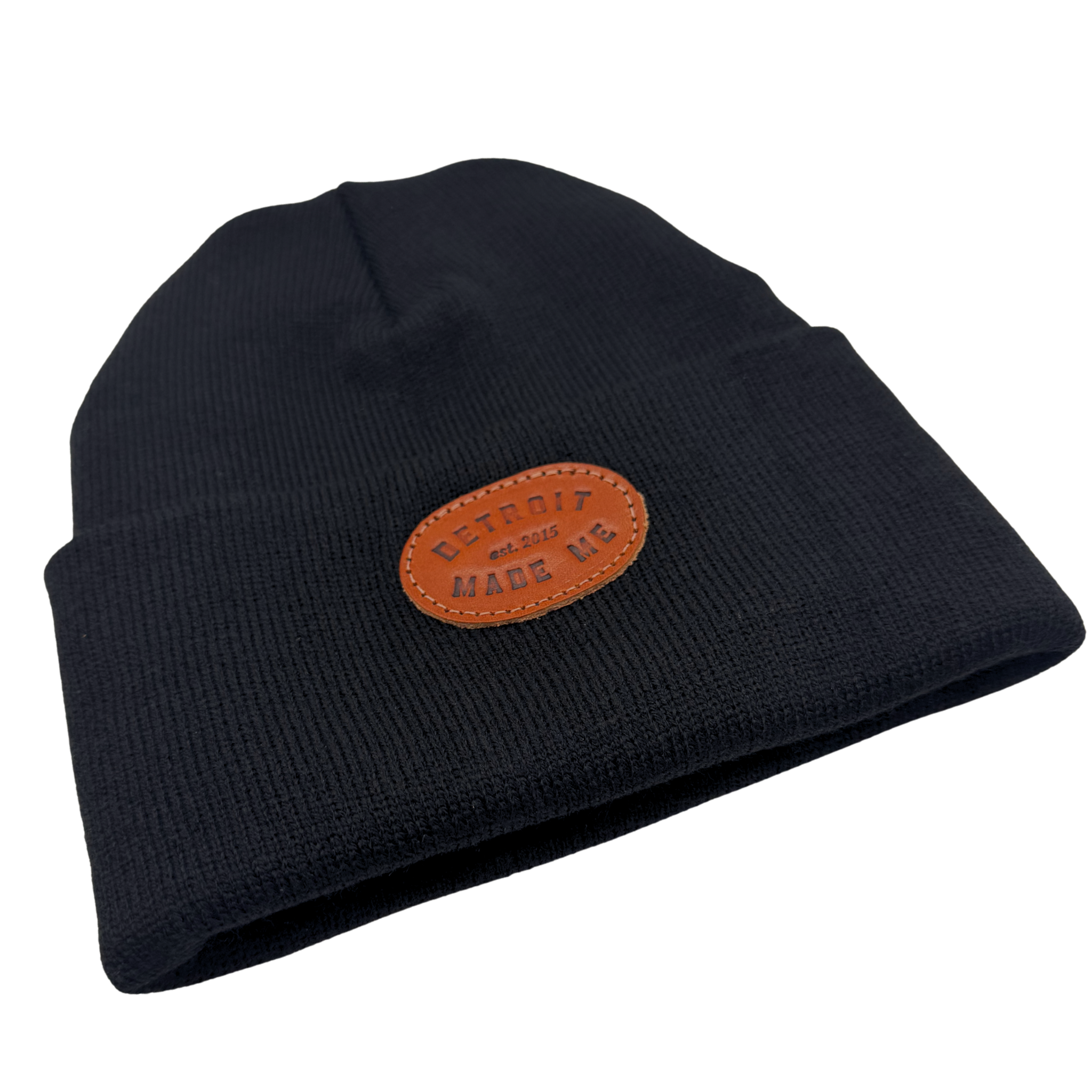 3D knit hats made in Detroit with upcycled yarn. Hand sewn and made with zero waste. Pictured here in Onyx black, with leather “ Detroit Made Me” leather patch. A cozy warm winter hat made in the USA.