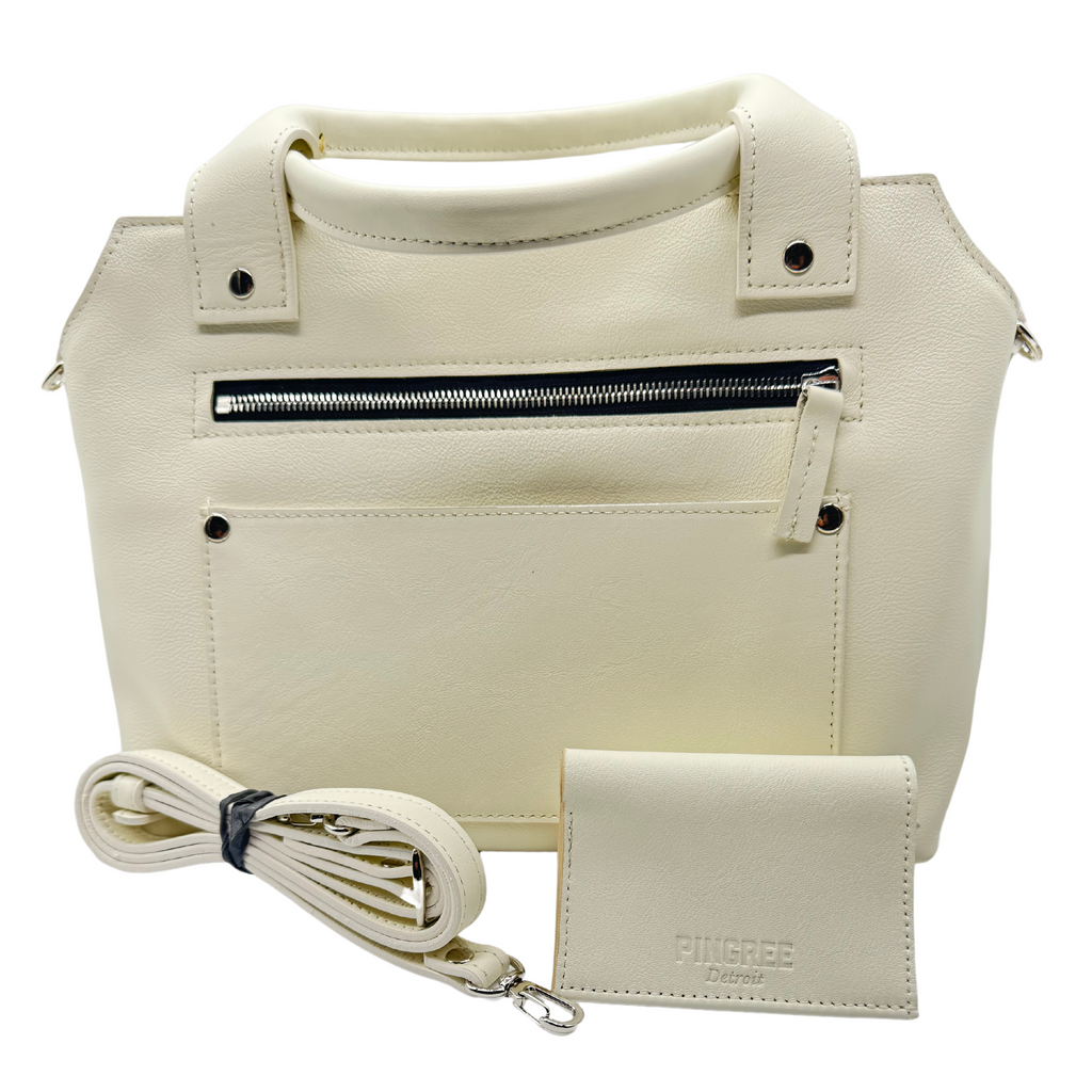 Pingree cross-body purse in off-white with cross-body strap and matching willow run wallet. Rear shown with zipper  and pocket