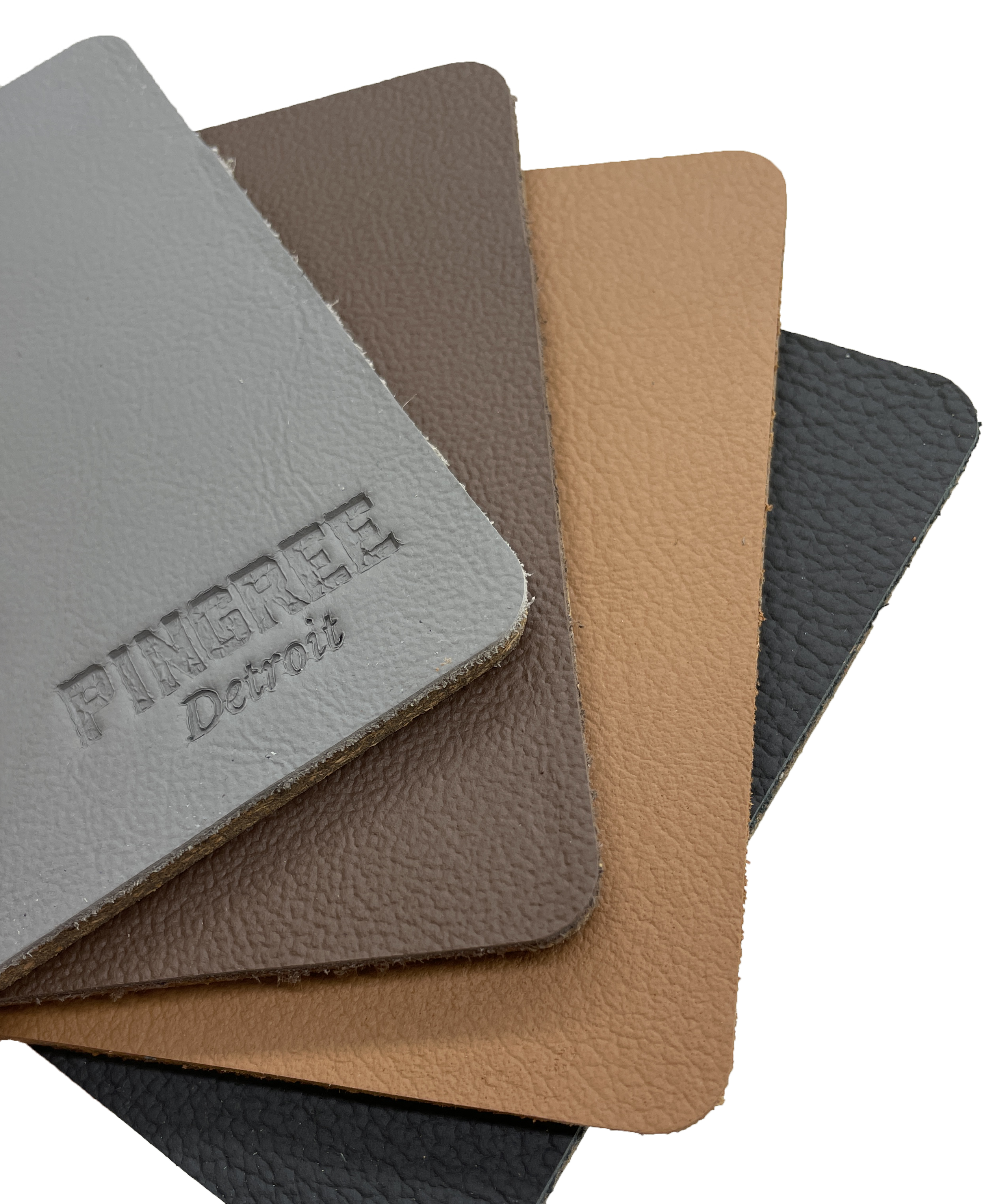 Assorted Leather Corktown Coasters manufactured in Detroit from sustainable materials