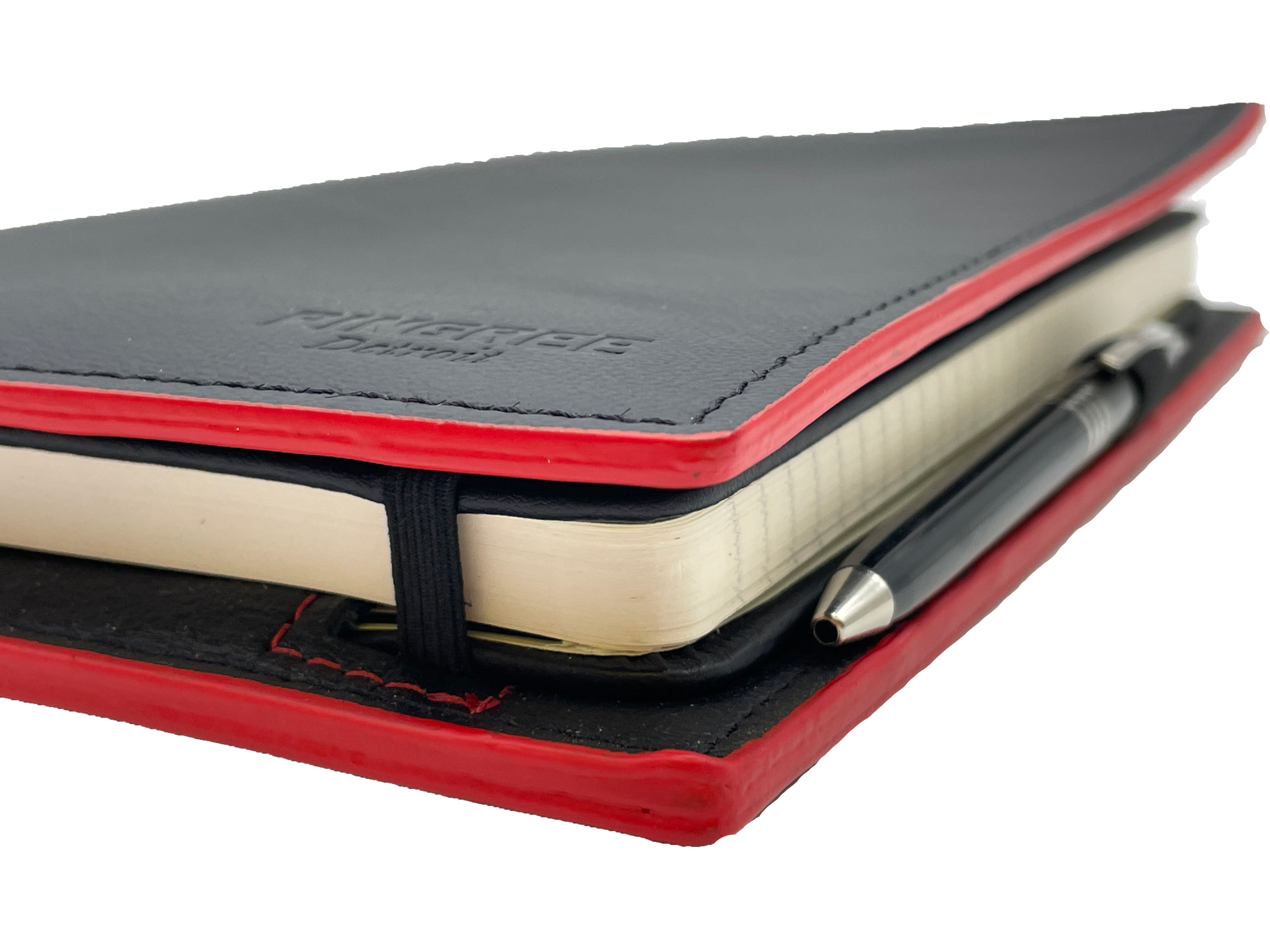 Detail of red edge paint of the Pingree Moleskin Work Folio. Sustainable leather sourcing from waste from the automotive industry. This Work folio is Made for work or for journaling or for business or for school. It’s a compact work for the business cards and his maiden Detroit by Veterans and DETROITERS.