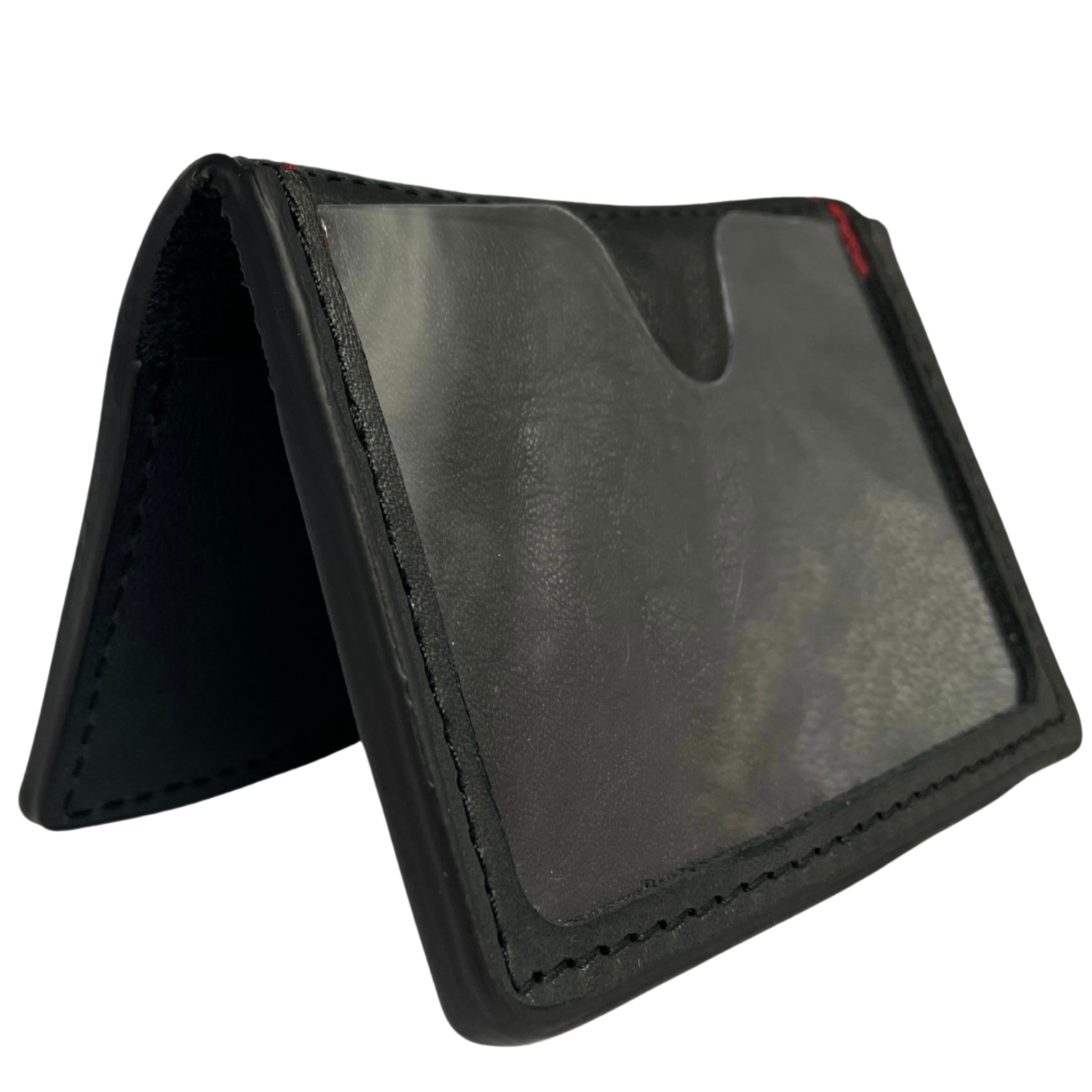 Pictured here in Onyx black with the ID window empty and facing forward. A five pocket minimalist front pocket wallet made with leather upcycled from the production of new cars, wallet is handmade in the USA, made in America, made in Detroit, with a ID window and five cars slots each holding two cards plus a cash pouch in the middle.
