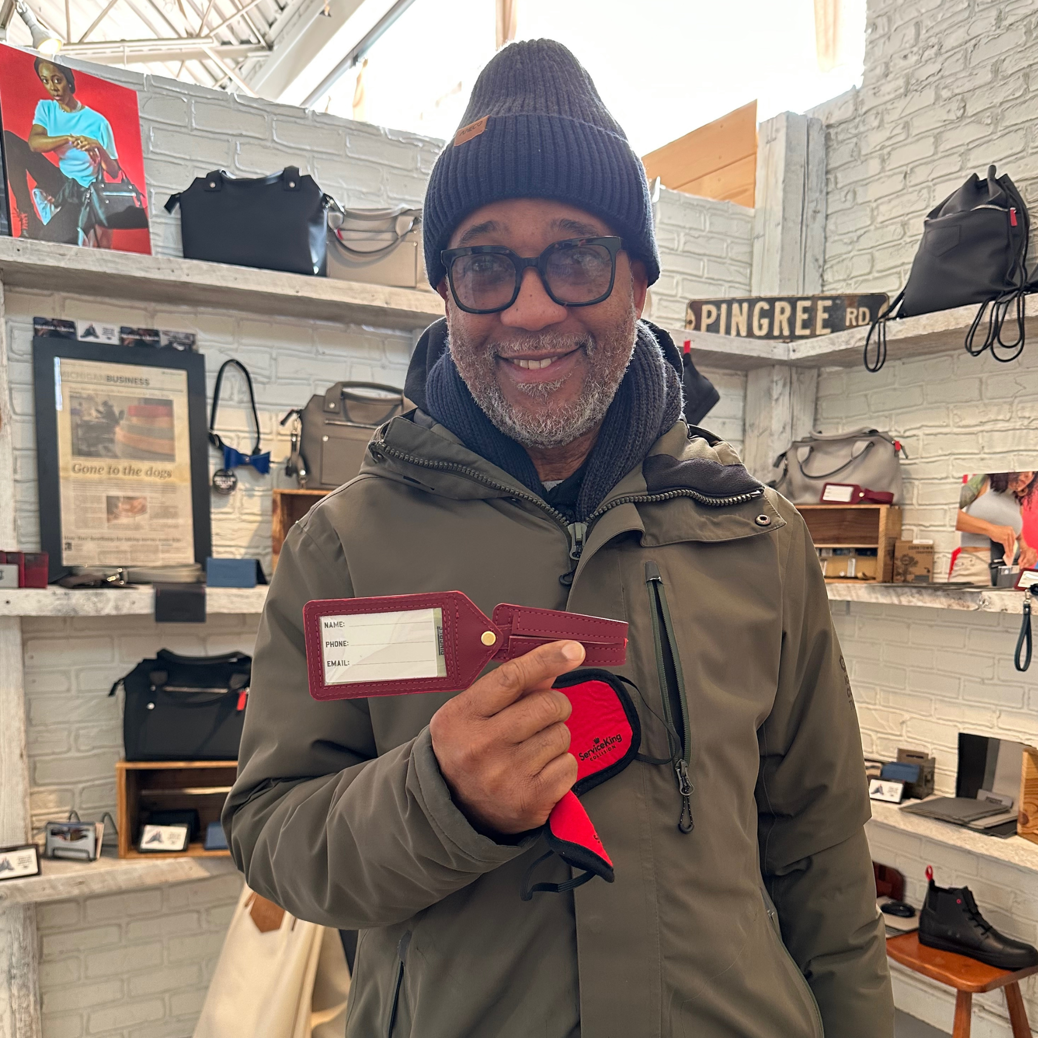 Luggage tag mad in Detroit by hand with upcycled leather from the auto industry . Made in the USA sustainably.