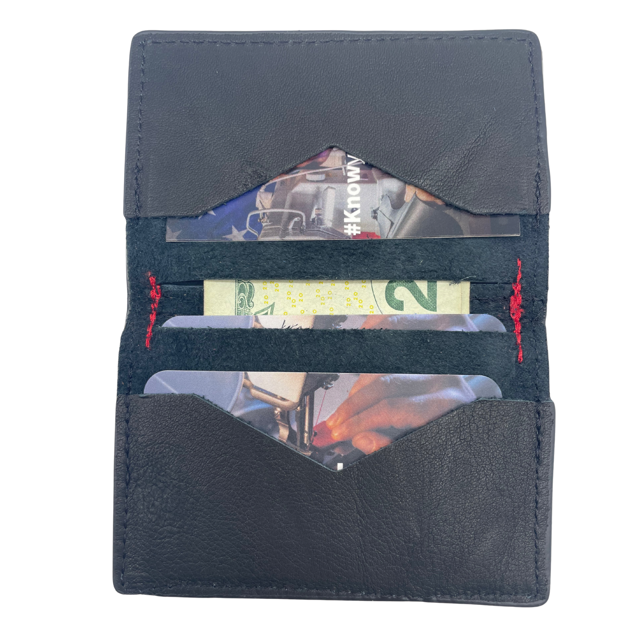 A five pocket minimalist front pocket wallet- here shown open- made with leather upcycled from the production of new cars, wallet is handmade in the USA, made in America, made in Detroit, with a ID window and five cars slots each holding two cards plus a cash pouch in the middle.