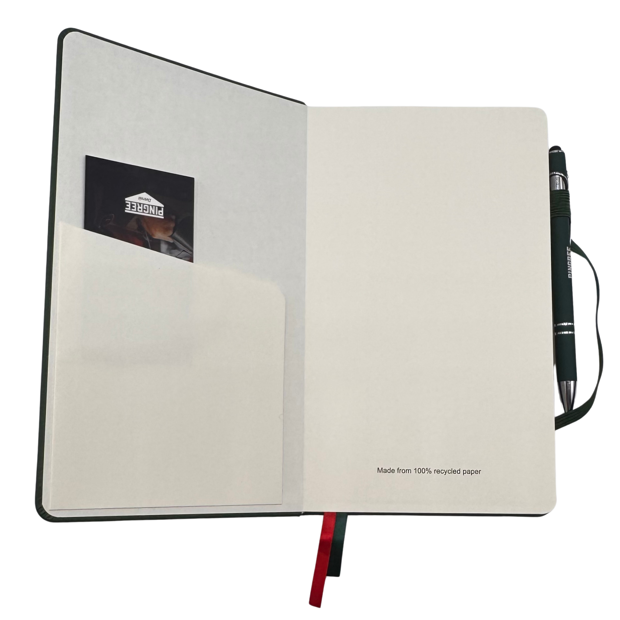 Open notebook with a pen holder on a white background