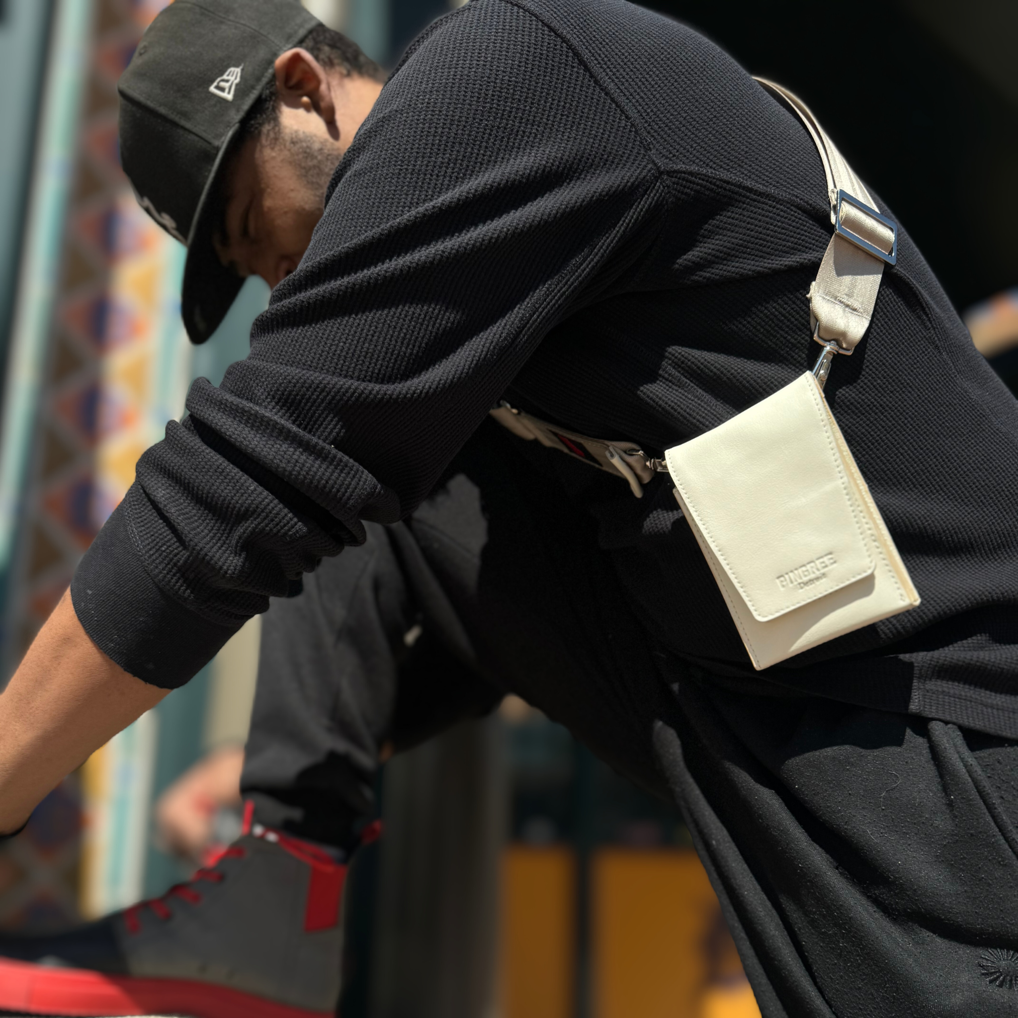 The Motown venue bag, a pouch sized to get into any sports, stadium, concert venue, and performance hall. Pictured here in macadamia with seat belt strap option. 4” x 6” x 1.5” Handmade by Veterans and DETROITERS with Upcycled leather from the auto industry. Available with a leather strap or a seatbelt strap.