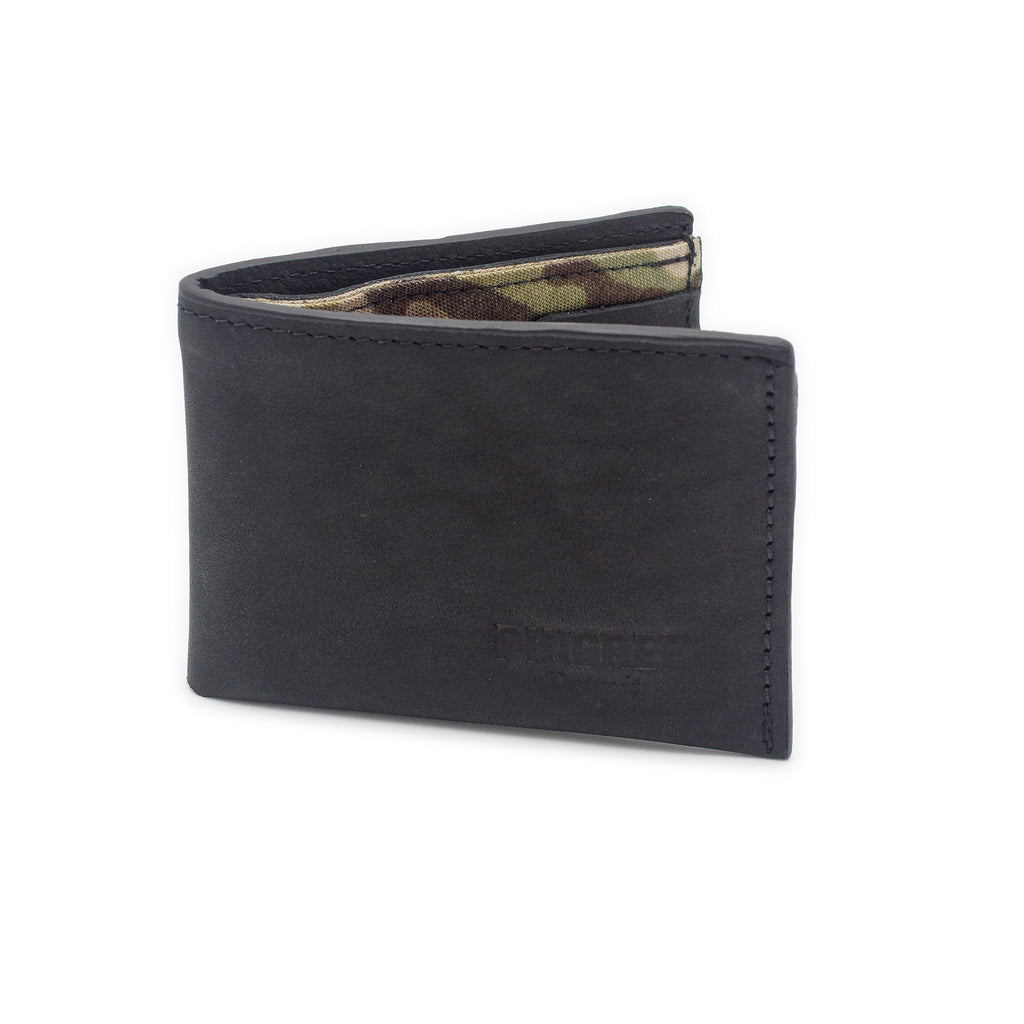 Onyx black billfold wallet, pictured here open. Made in Detroit, Michigan USA. Big enough for George Costanza, 10 pockets, leather upcycled from the production of new cars, handmade in Detroit by U.S. Veterans and Detroiters. Liner made from upcycled material from the production of Army tents.  