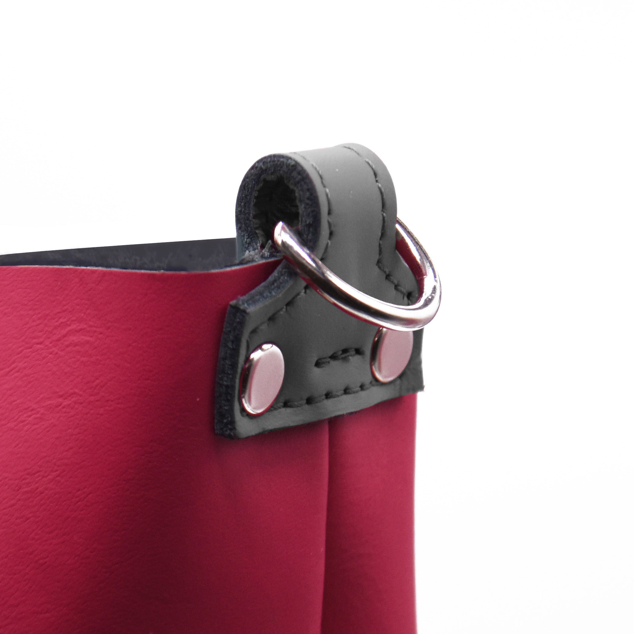 Close up on the Pink bag with slate grey d-ring holders. 