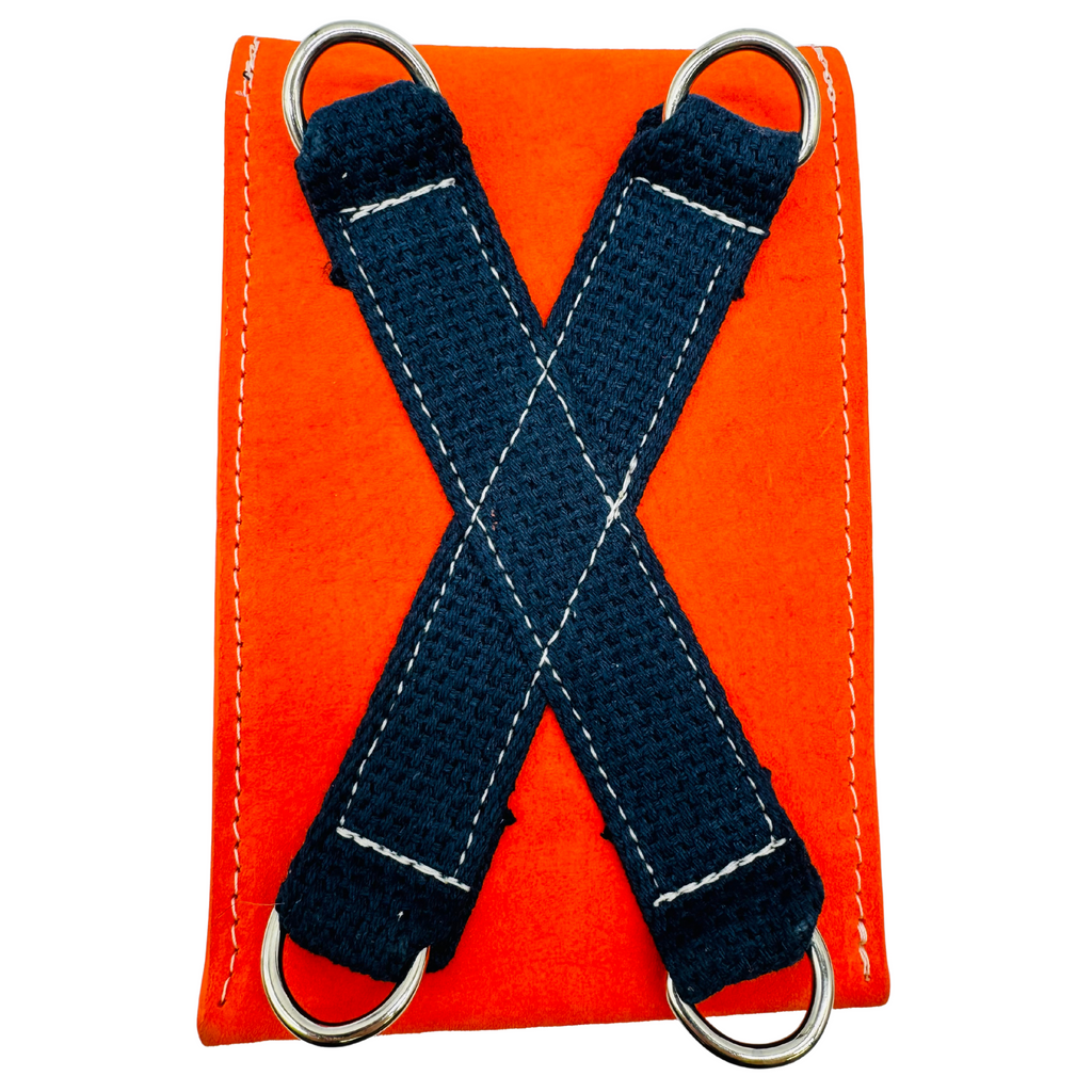 Rear profile. The Motown venue bag, a pouch sized to get into any sports, stadium, concert venue, and performance hall. Pictured here in Tiger Lily orange with seat belt strap option. 4” x 6” x 1.5” Handmade by Veterans and DETROITERS with Upcycled leather from the auto industry. Available with a leather strap or a seatbelt strap.