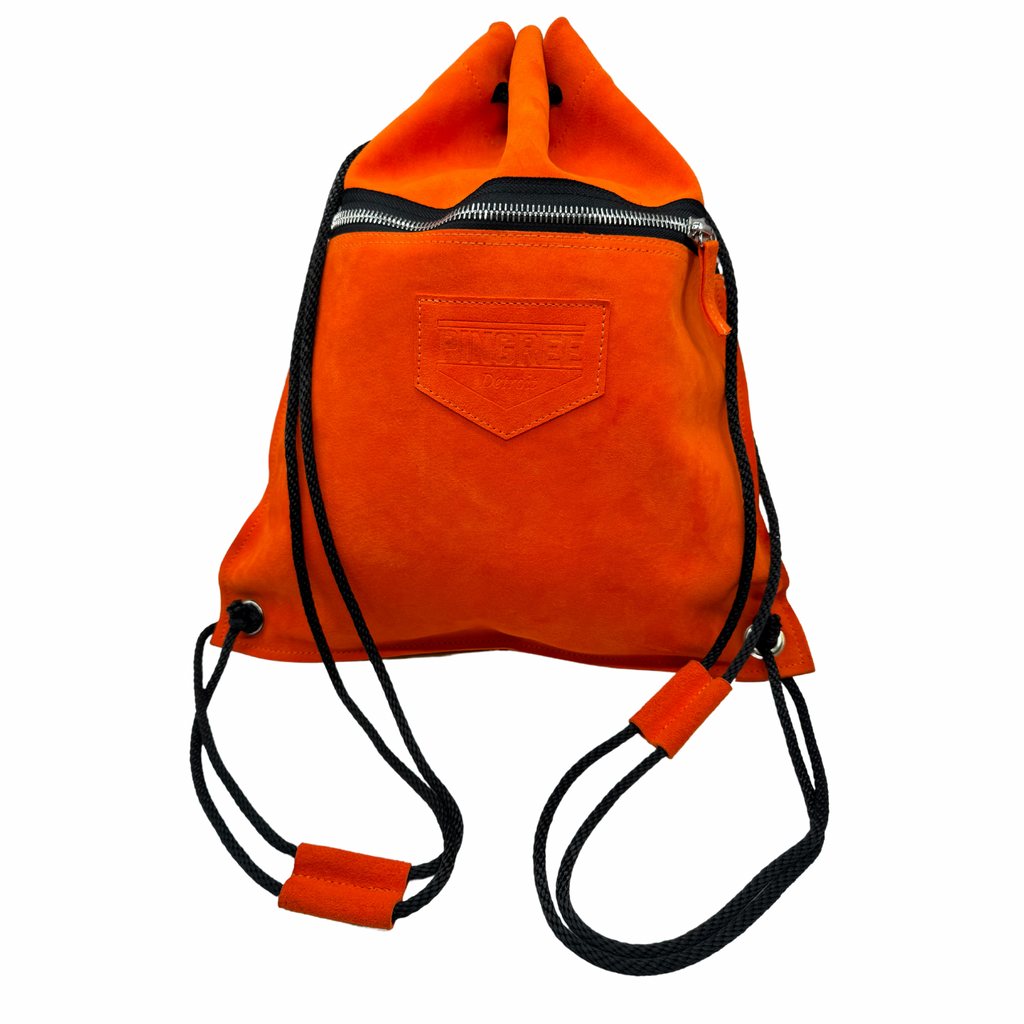 Orange suede leather drawstring bag made in Detroit