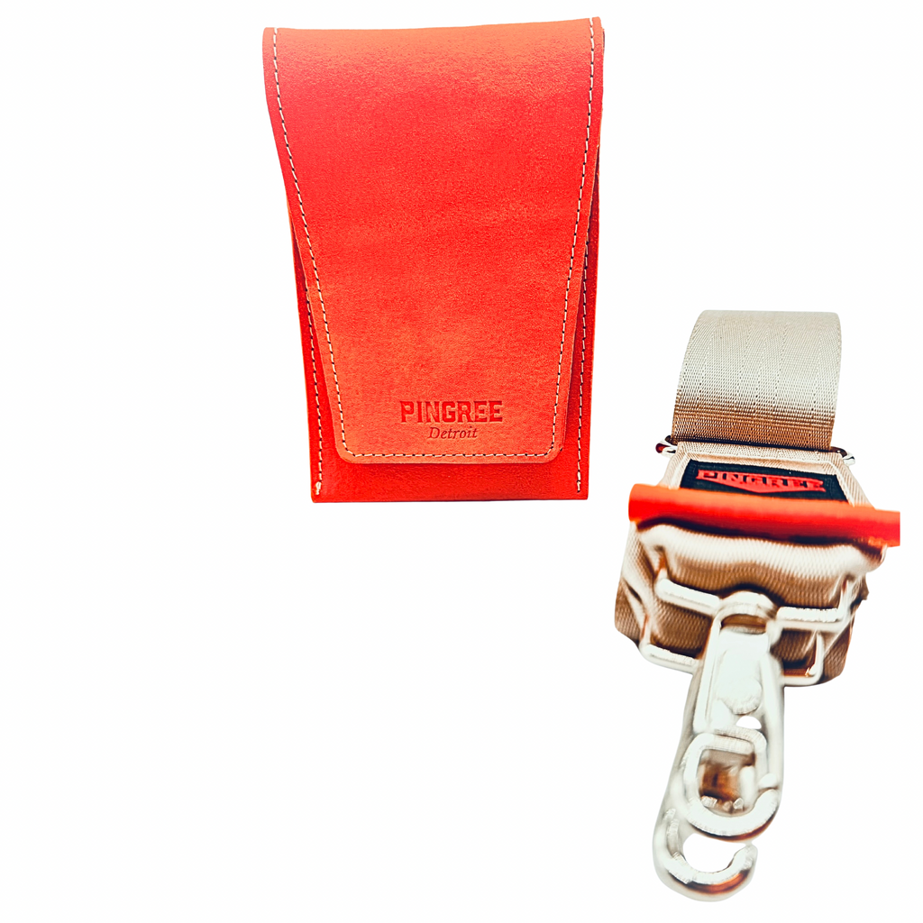 The Motown venue bag, a pouch sized to get into any sports, stadium, concert venue, and performance hall. Pictured here in Tiger Lily Orange with seat belt strap option. 4” x 6” x 1.5” Handmade by Veterans and DETROITERS with Upcycled leather from the auto industry. Available with a leather strap or a seatbelt strap.