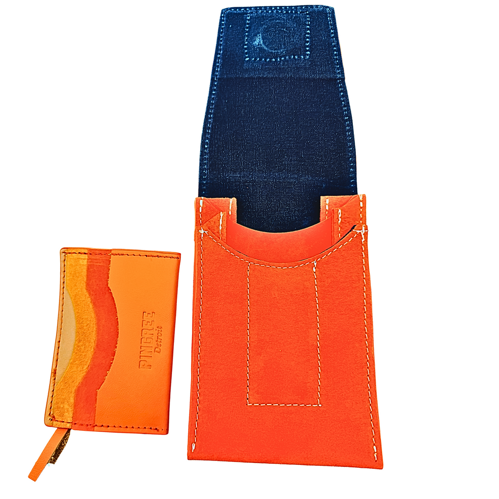 The Motown venue bag, a pouch sized to get into any sports, stadium, concert venue, and performance hall. Pictured here in Tiger Lily orange with seat belt strap option. Wallet not included 4” x 6” x 1.5” Handmade by Veterans and DETROITERS with Upcycled leather from the auto industry. Available with a leather strap or a seatbelt strap.