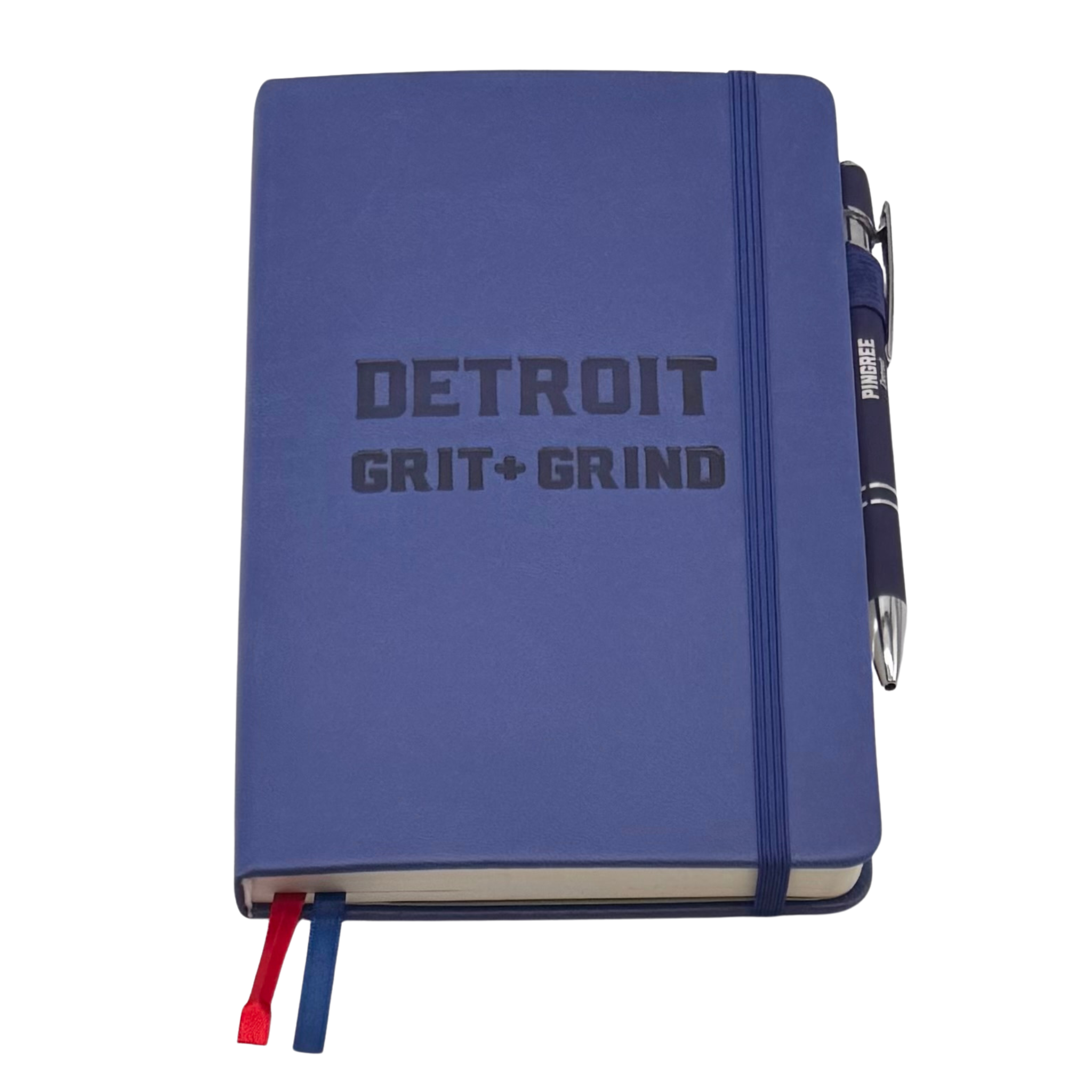 Blue notebook with 'Detroit Grit + Grind' text and a pen on a white background. Our hand assembled Journal crafted with 100% recycled paper pulp with lined pages. Detroit made me. Includes a pen, double bookmarks a front pocket and a rear pocket and elastic closure that we sew for reinforcement. A 5 size, comparable to a moleskine style, fits inside of our portfolio or works great as a standalone.