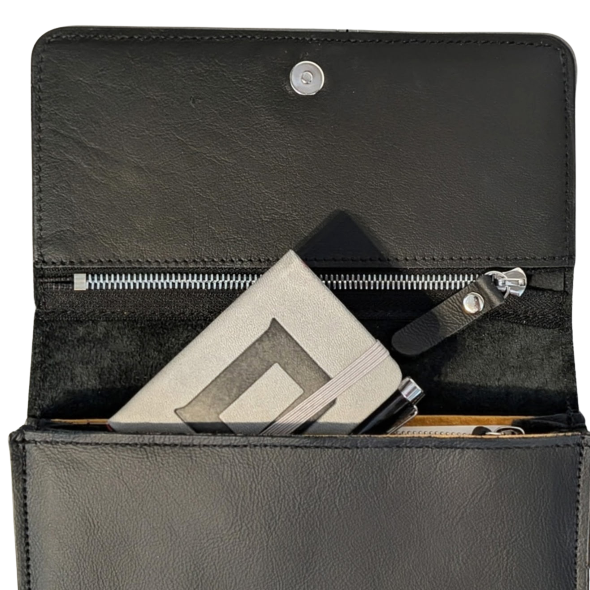 Black leather wallet with zipper open, showing cards and money and the Pingree pocket journal. 
