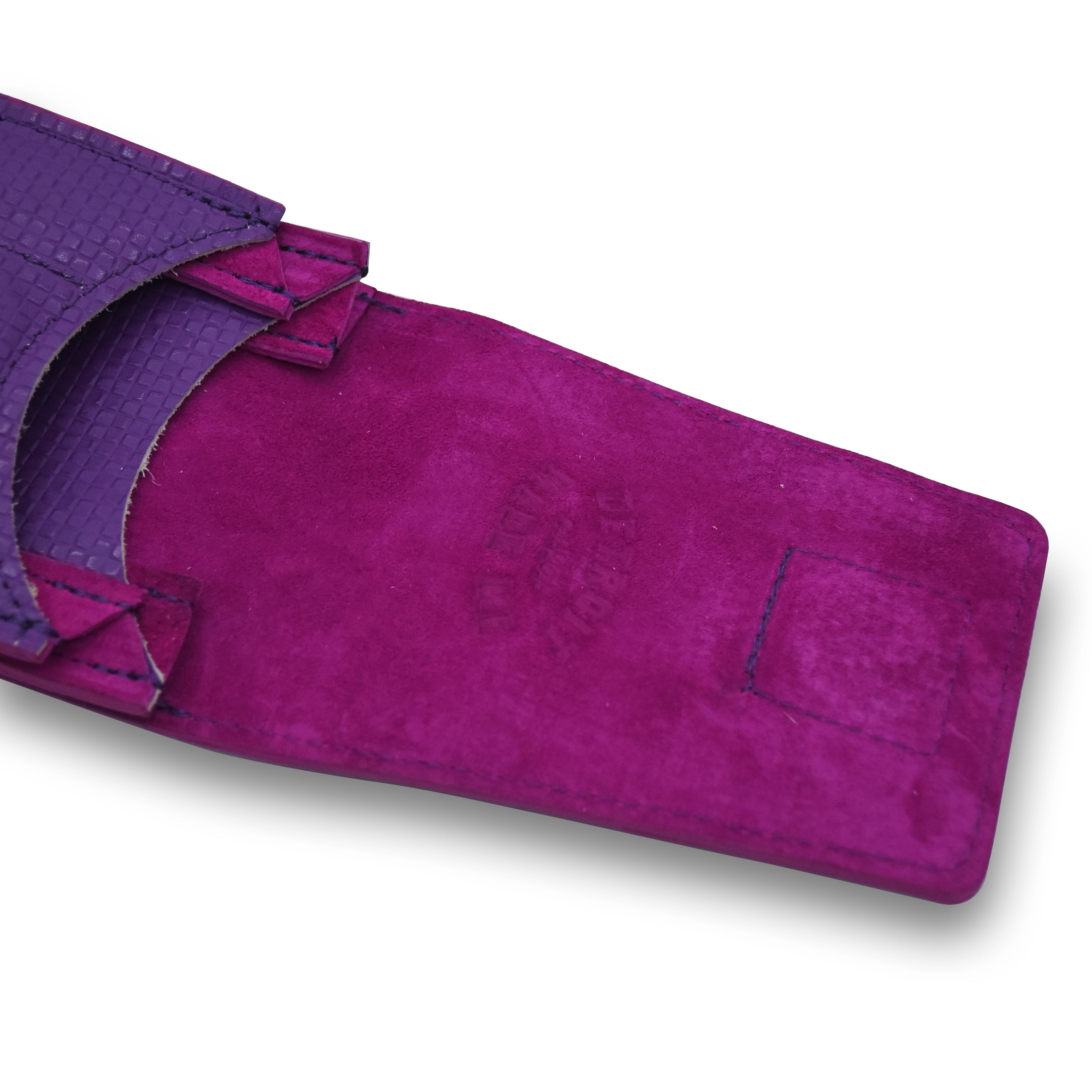 A close-up of a purple suede sleeve with a textured purple inner lining, photographed on a white background.