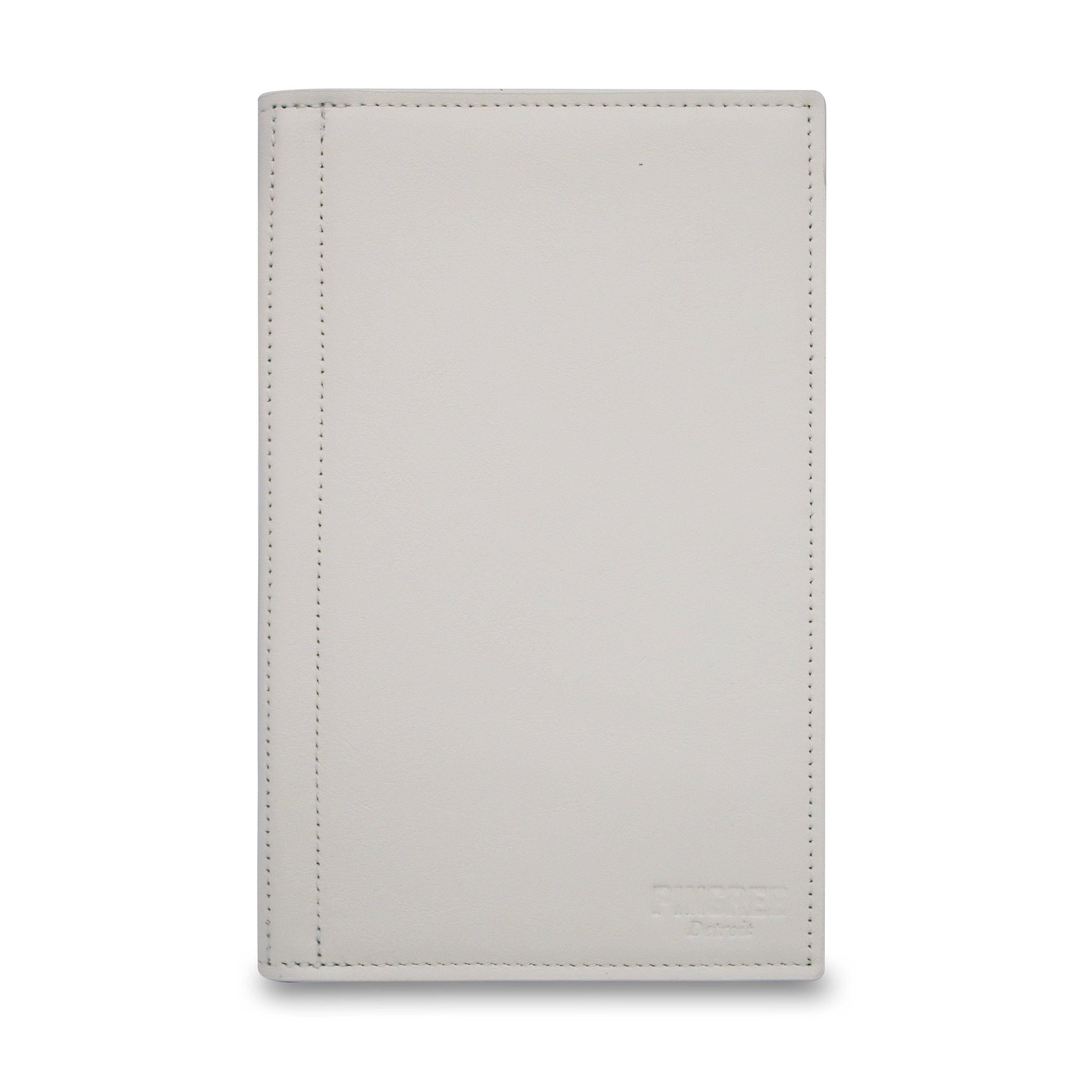 An off-white, “:Dire Wolf White" leather moleskine journal cover with precise stitching and a debossed logo in the bottom right corner, shown on a clean white background.