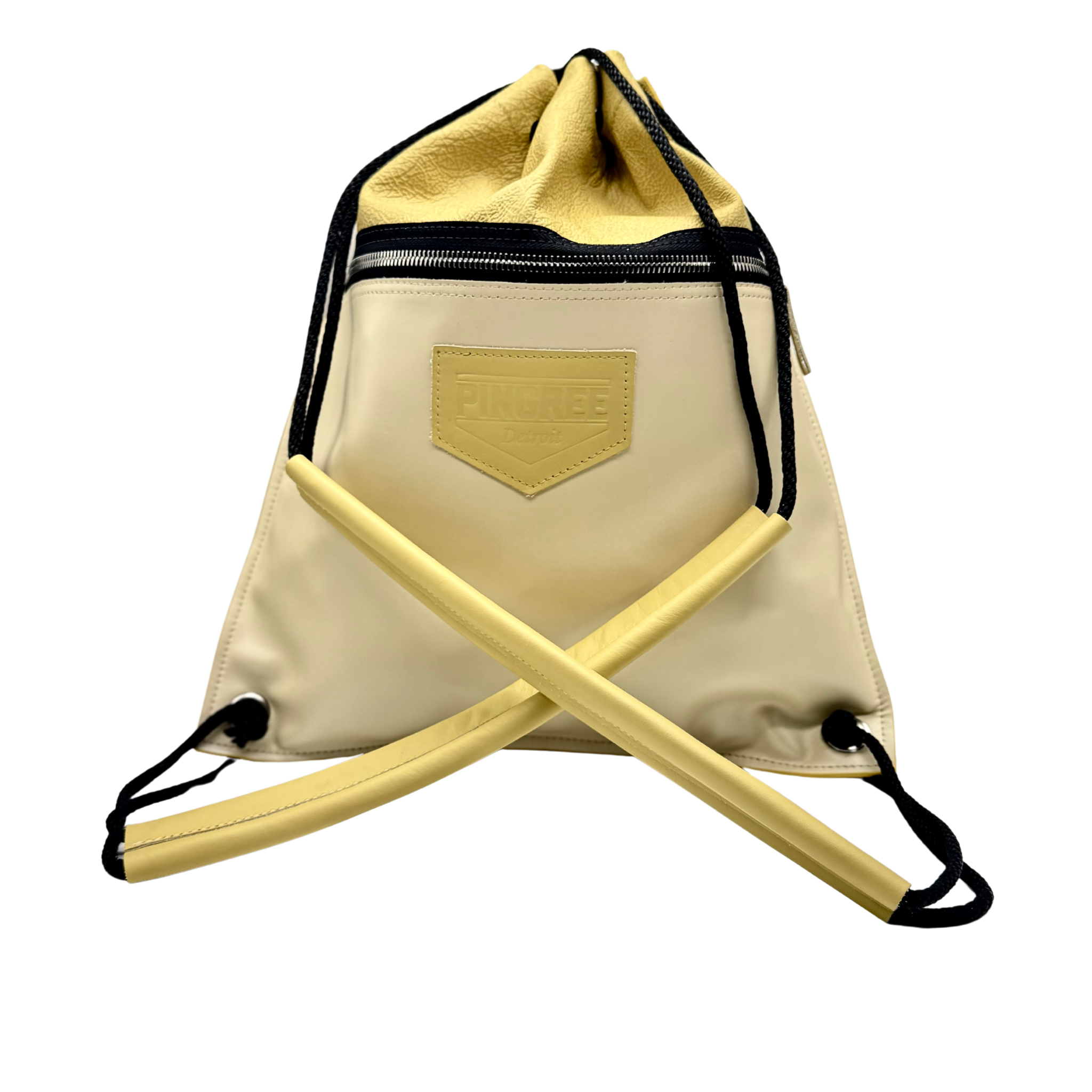 The Detroit drawstring with padded straps. Small drop in sunflower yellow, made in ￼ Detroit with cycled automotive leather crafted by Veterans and Detroiters for an American-made bag and work bag made for all seasons. 