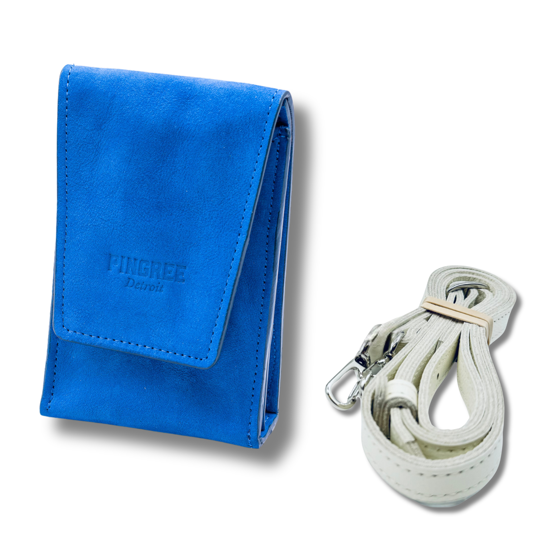 Royal blue suede leather on the exterior with blue on the inside and edges. A stadium bag that can be worn on a belt or as a crossbody. Carries your phone and features magnetic closure.  With leather strap on a white background. Made in Detroit with leather upcycled from the automotive industry with the Pingree logo on the front and silver hardware made in America. 