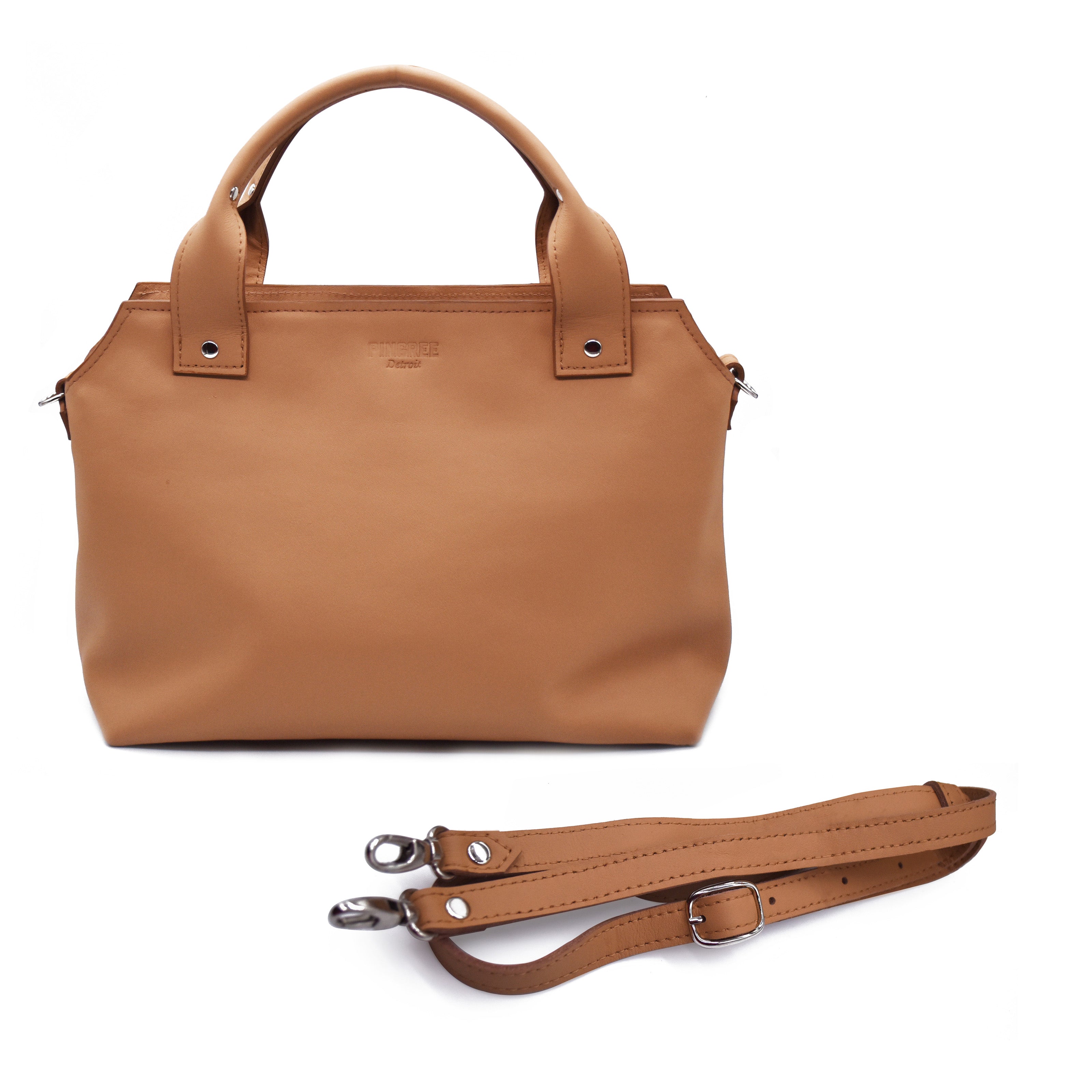 Sand tan purse. Handles upward. Silver rivets and silver hardware. Boston bag style with Detroit flair. Pingree Detroit logo top center in image with cross-body strap d-ring shown. 
