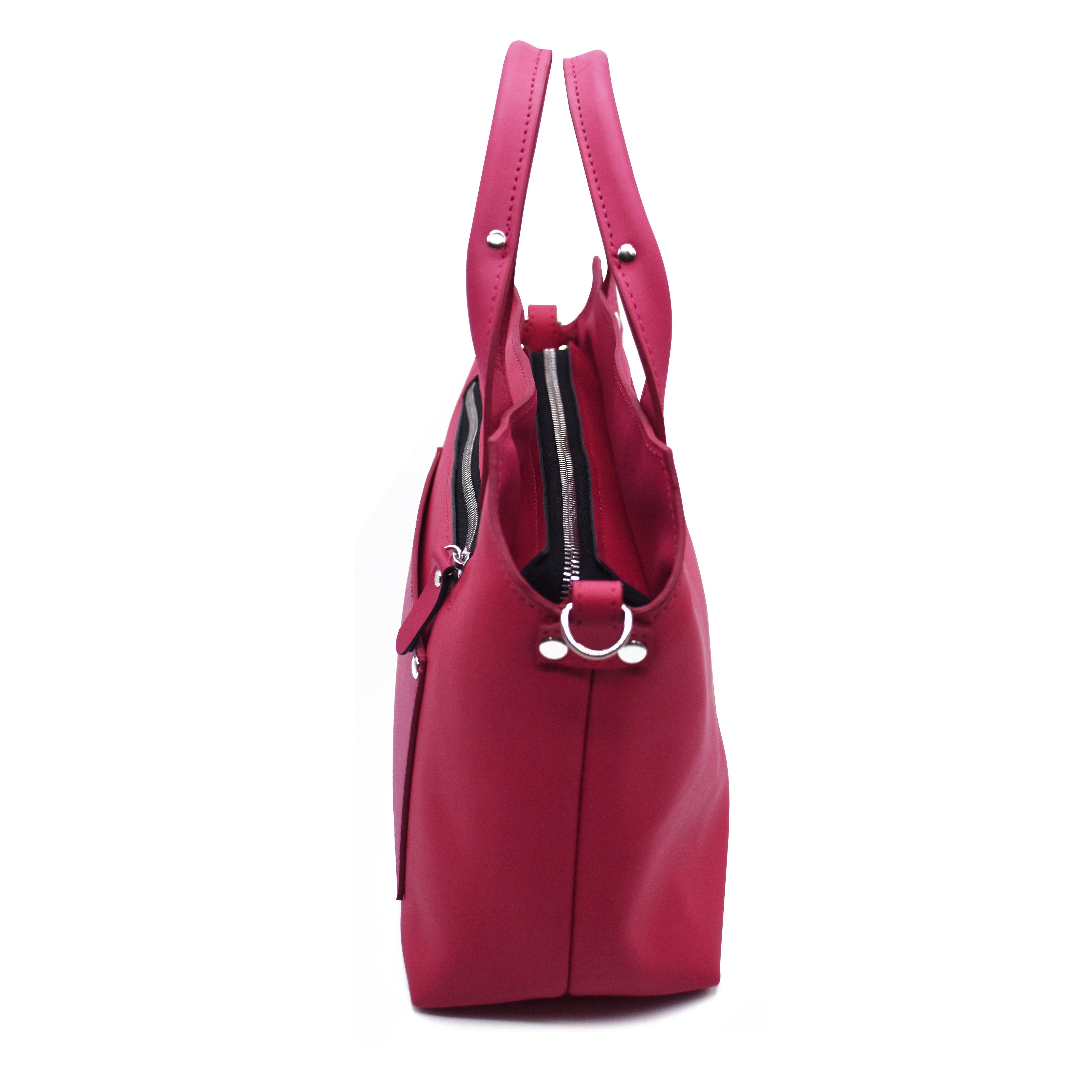 Pink handbag with a shoulder strap on a white background