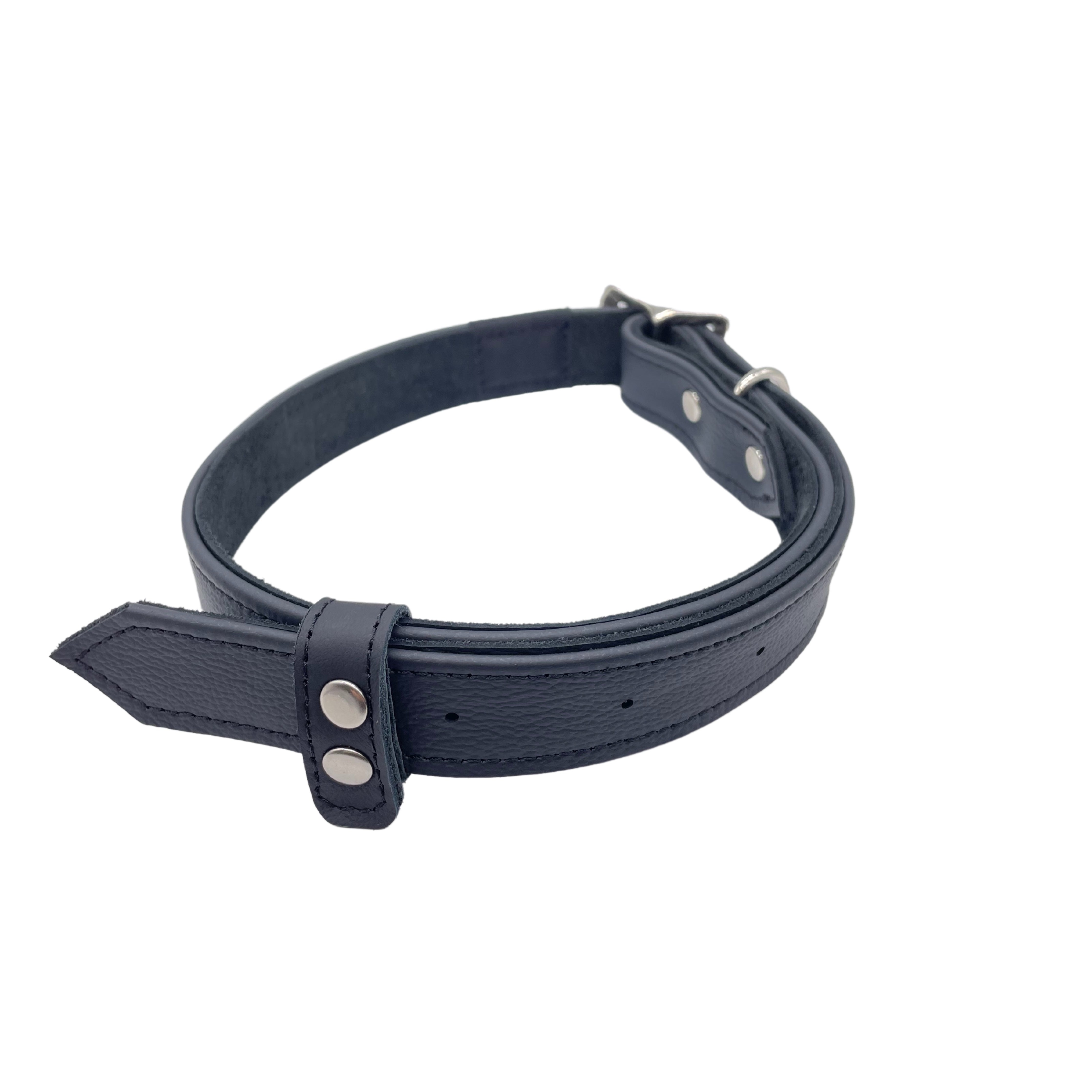 Pingree's Junkyard dog collar detail highlighting leather loop and American made rivets.